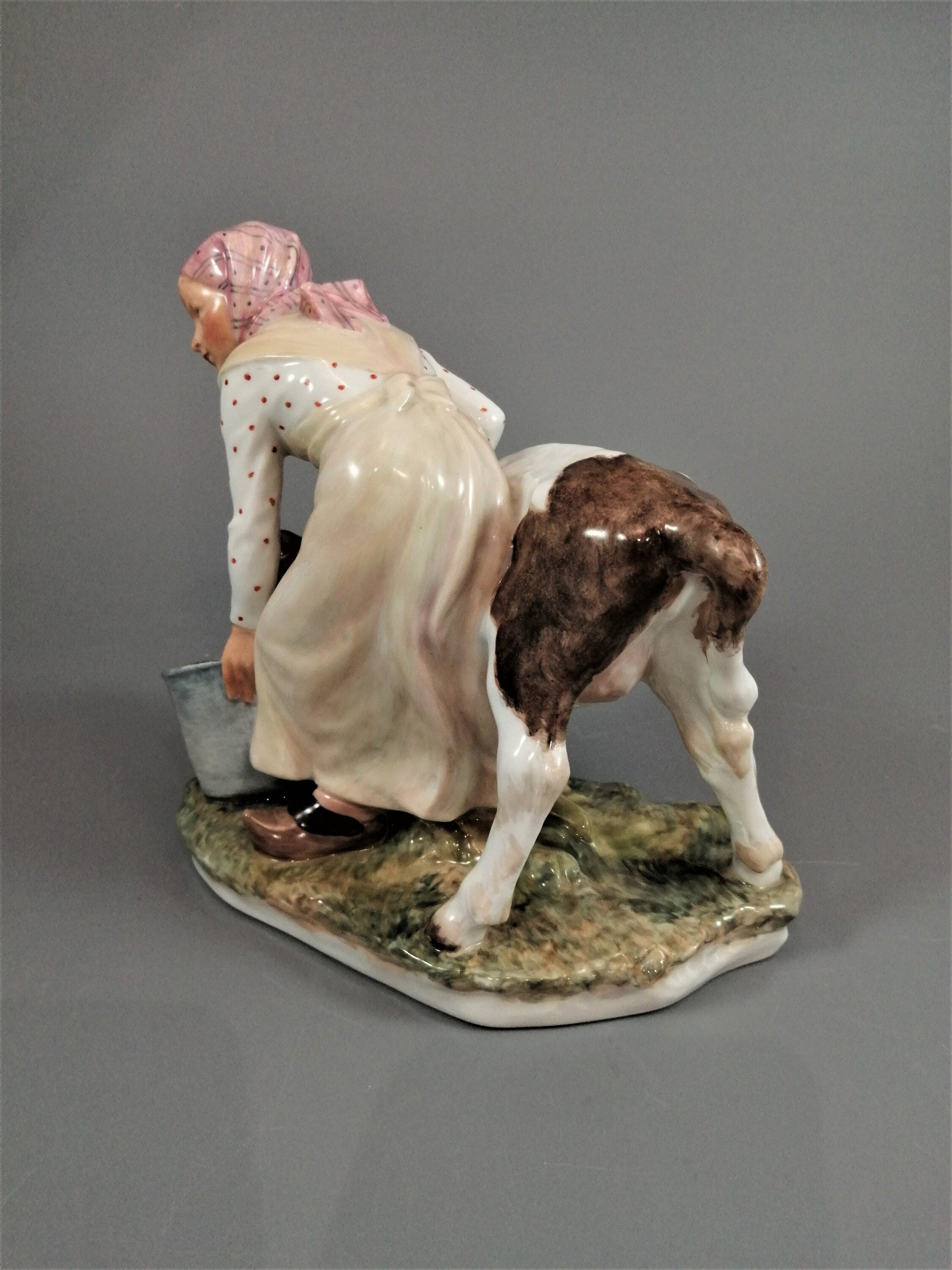 Royal Copenhagen Porcelain Figurine: Girl with Calf, Juliane Marie Polychrome
