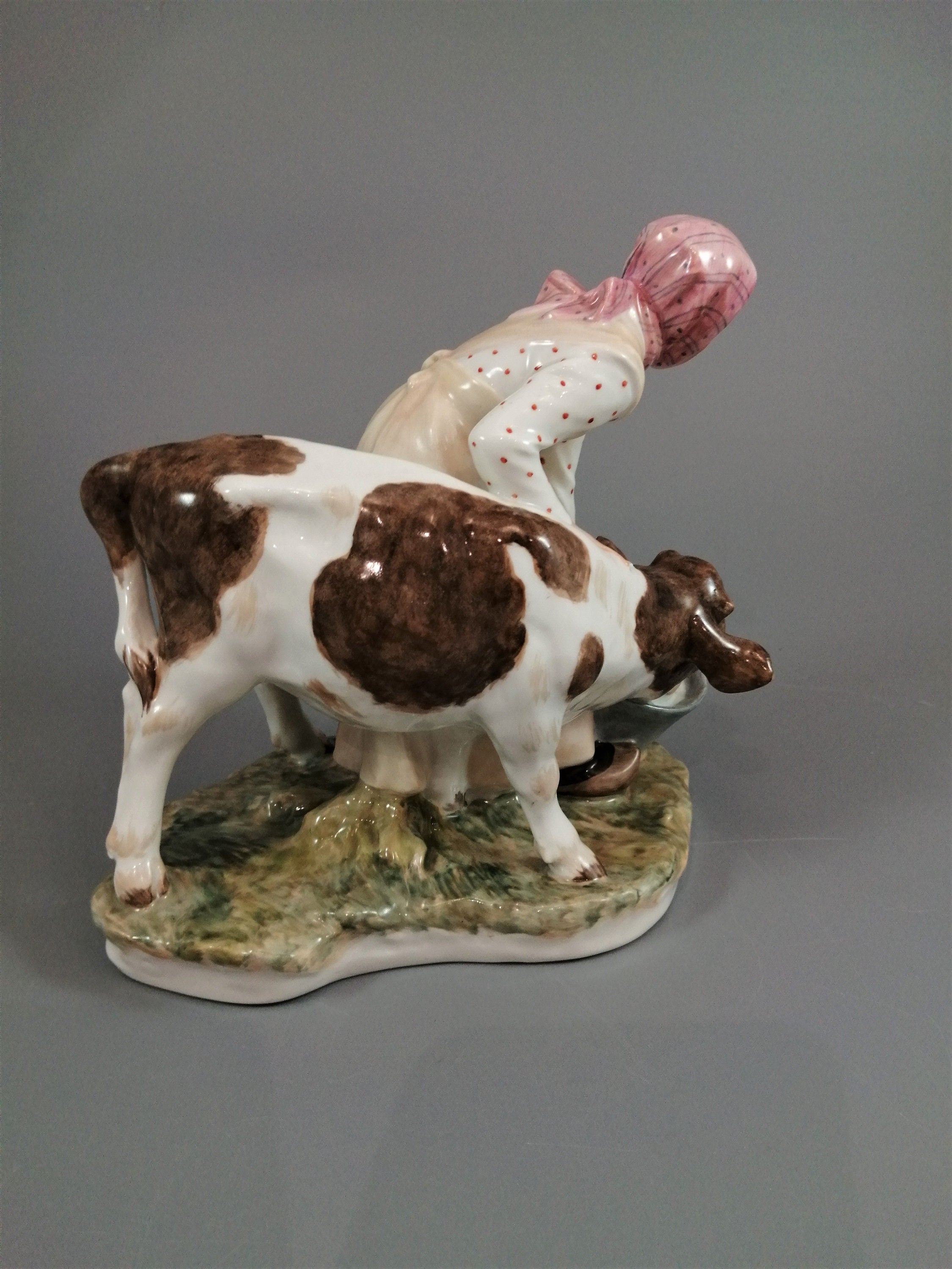 Royal Copenhagen Porcelain Figurine: Girl with Calf, Juliane Marie Polychrome