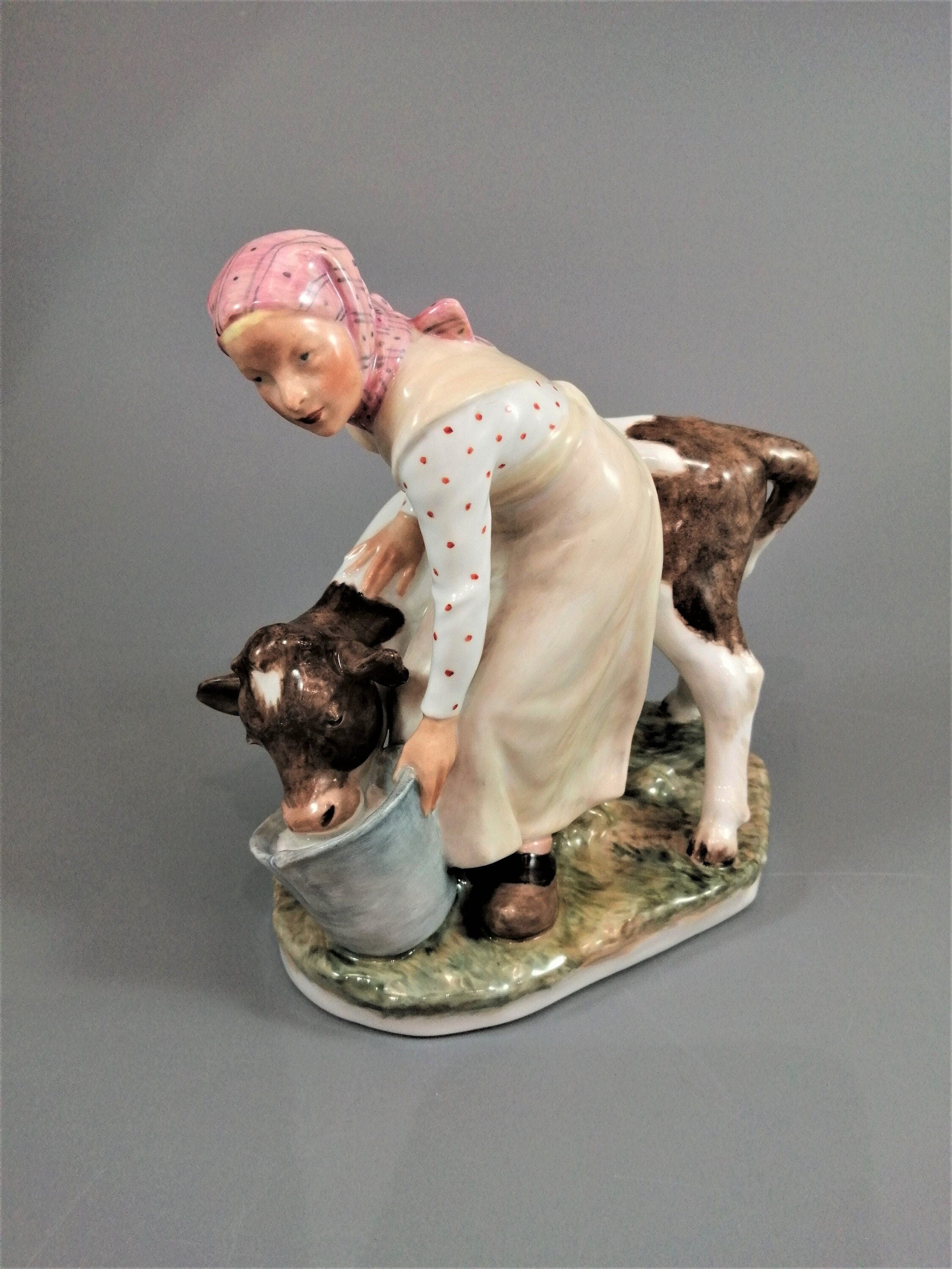Royal Copenhagen Porcelain Figurine: Girl with Calf, Juliane Marie Polychrome