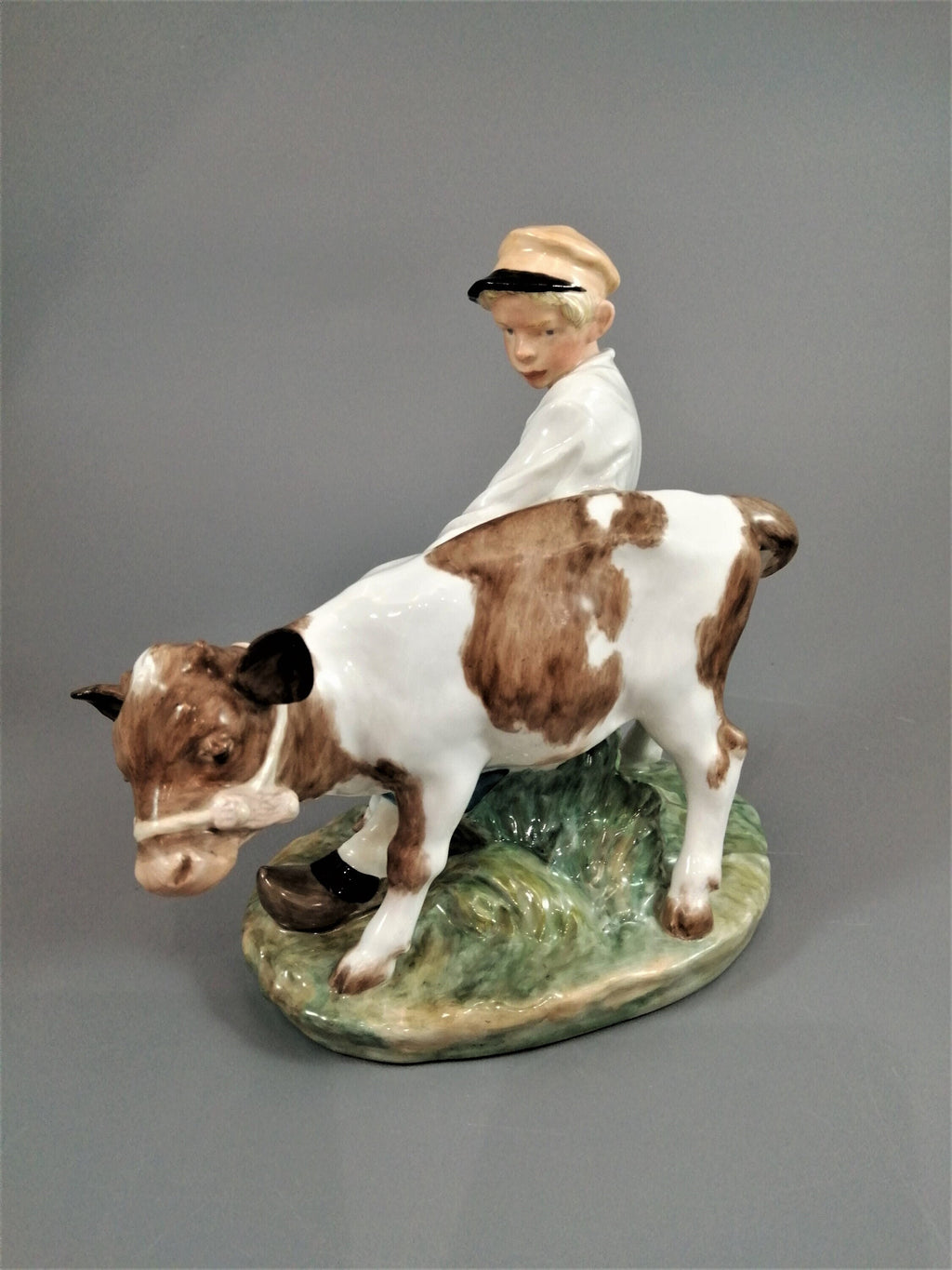 Royal Copenhagen Porcelain Figurine: Boy with Calf, Juliane Marie Design