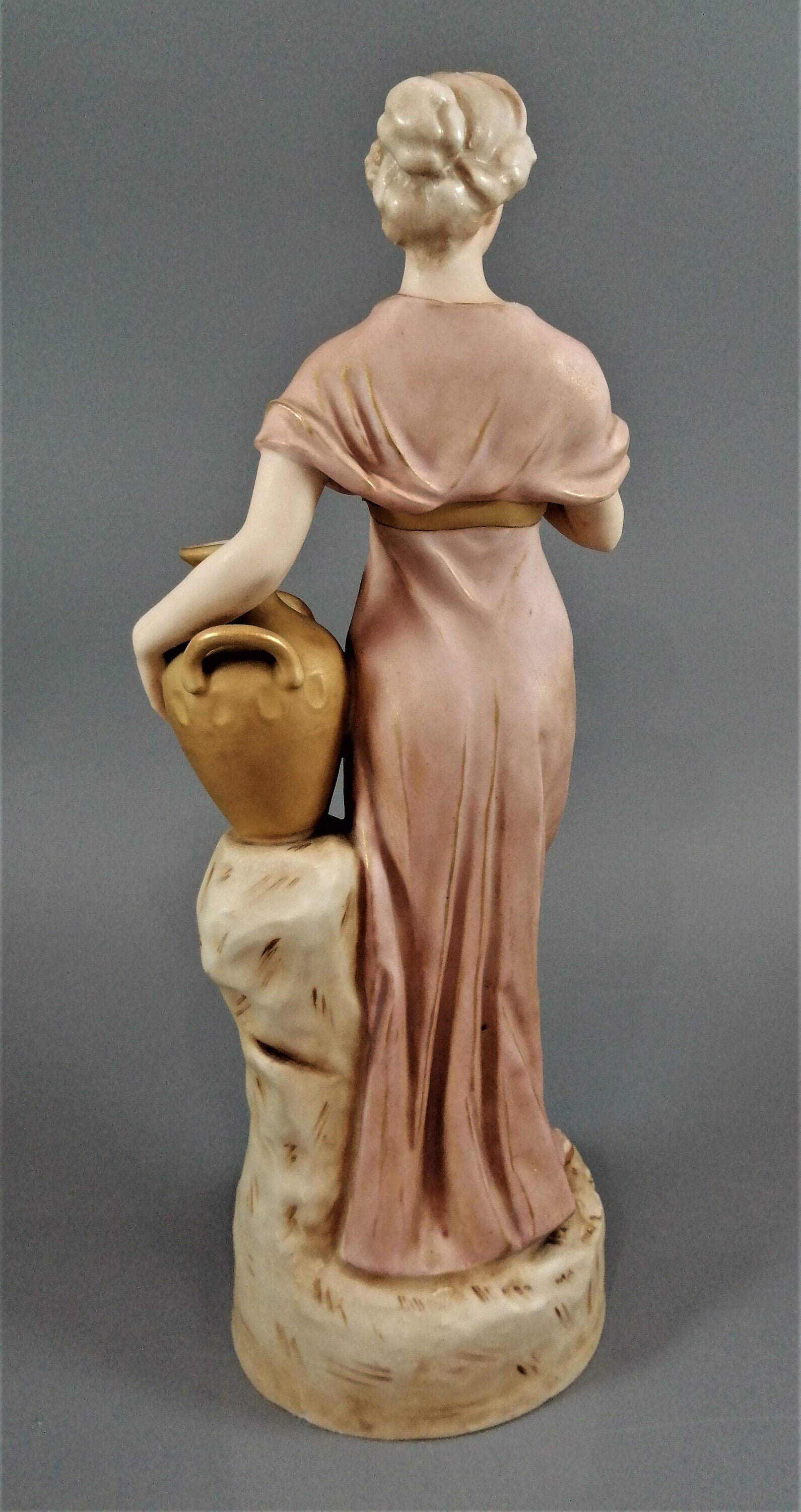 Antique Royal Dux Porcelain Figurine: Lady with Jug