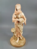 A rare Royal Worcester figurine titled "Musician," depicting a lady with a drum , 1898.