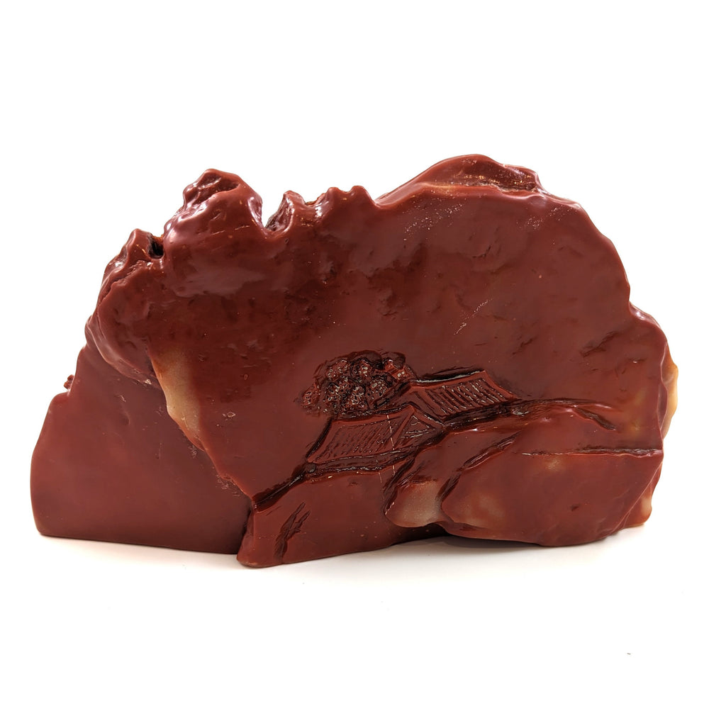 Chinese carving made from rare chicken-blood stone