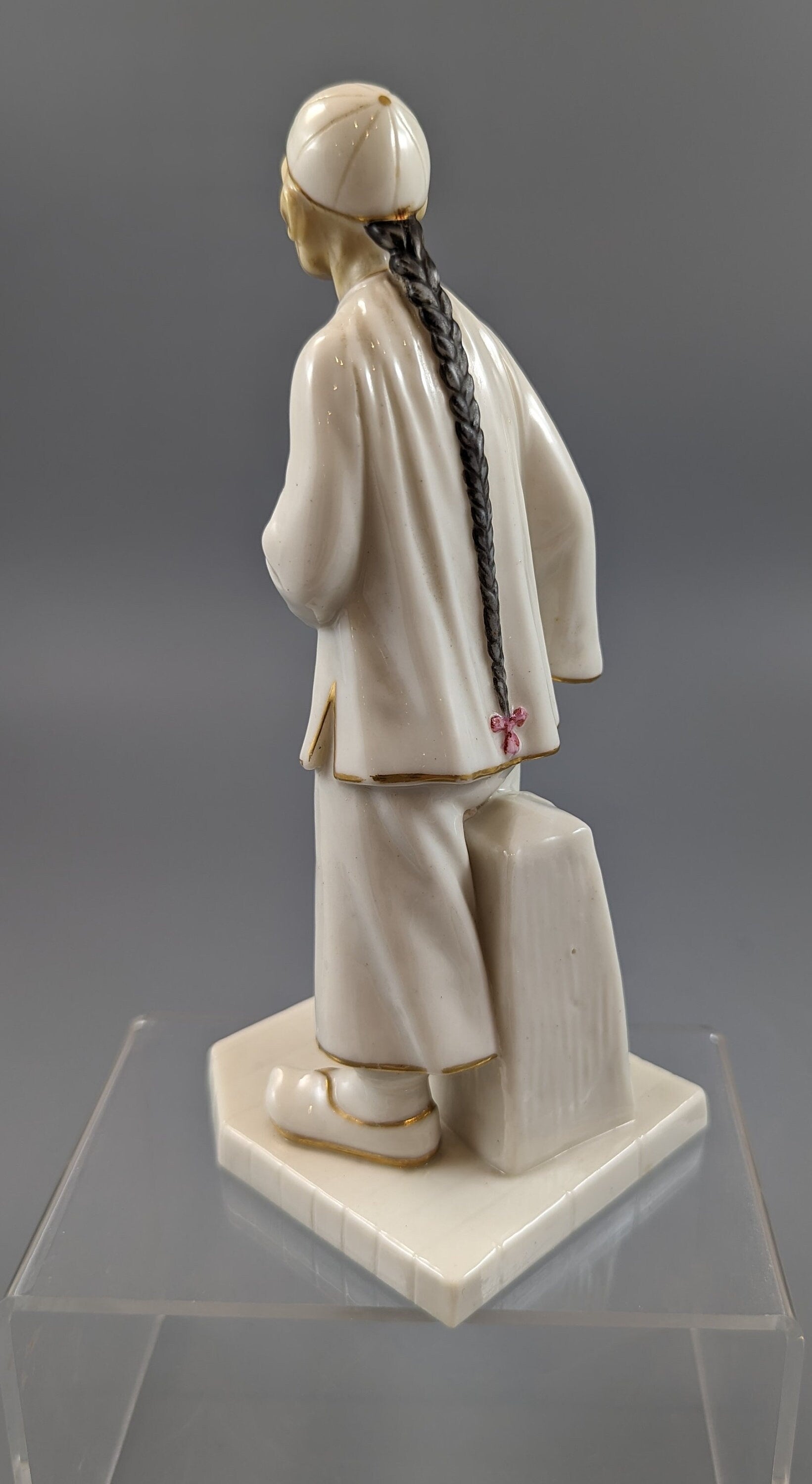 A Royal Worcester figure of a Chinese man,1883
