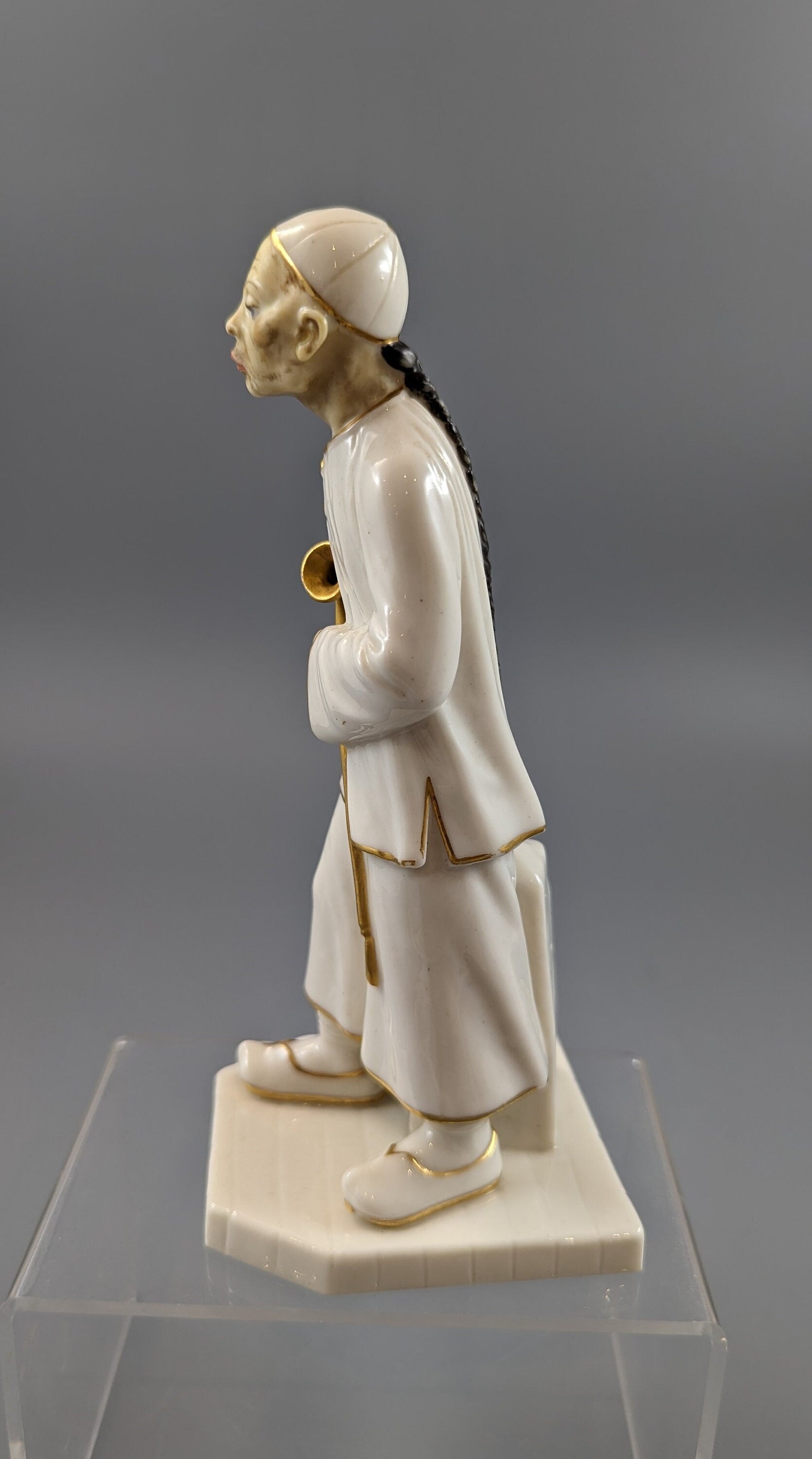 A Royal Worcester figure of a Chinese man,1883