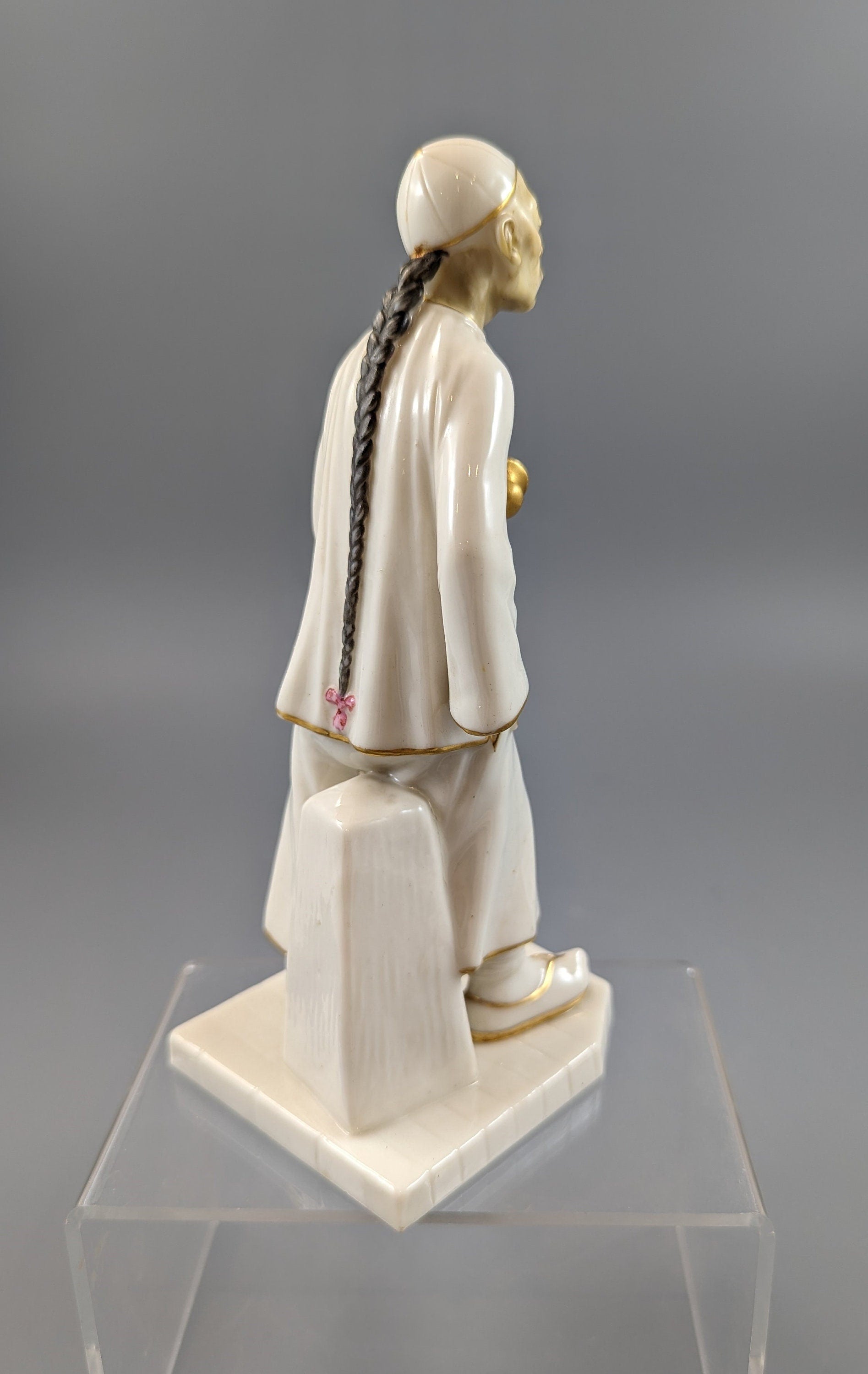 A Royal Worcester figure of a Chinese man,1883