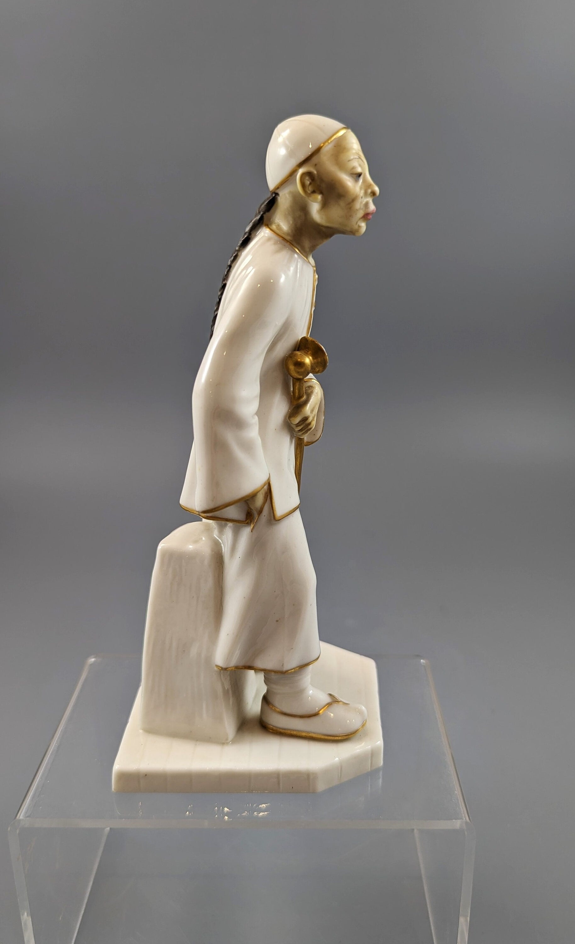 A Royal Worcester figure of a Chinese man,1883