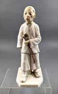 A Royal Worcester figure of a Chinese man,1883