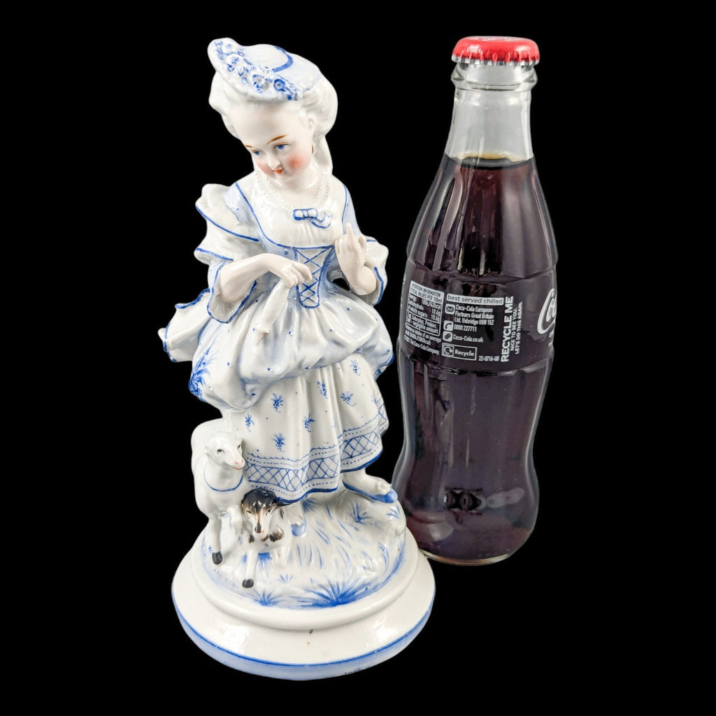 19th century German glazed porcelain figurine of a shepherdess by Conta & Boehme