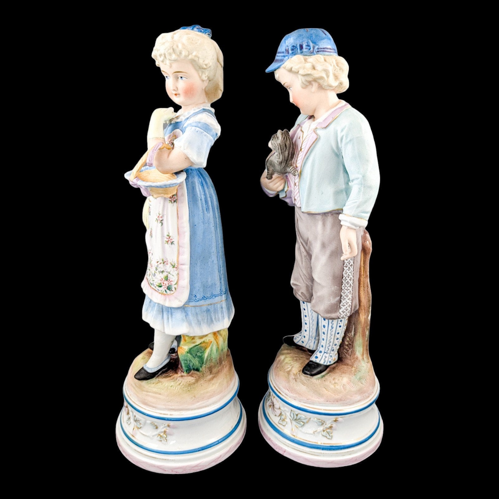 Pair of large antique 19th century French bisque porcelain figurines