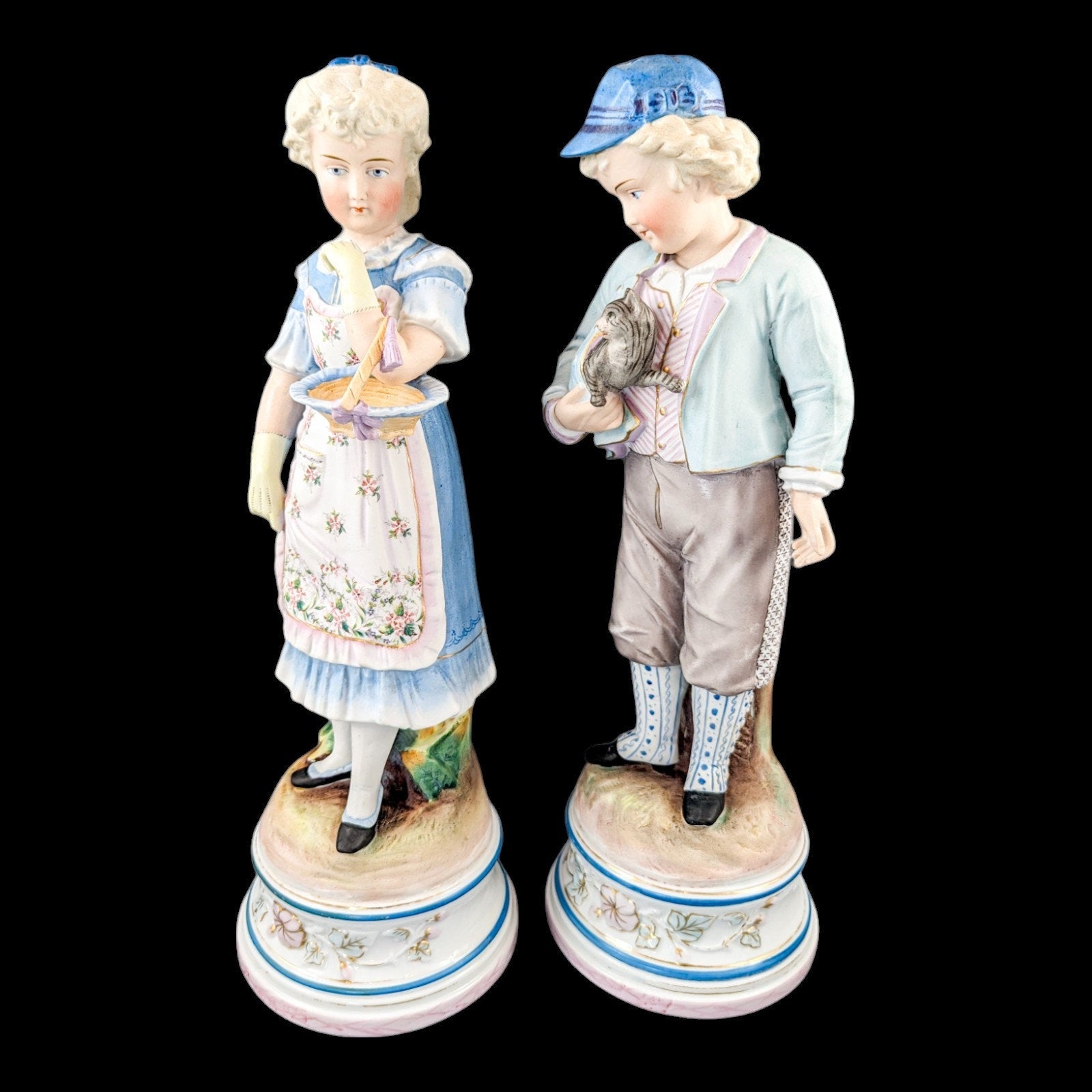Pair of large antique 19th century French bisque porcelain figurines