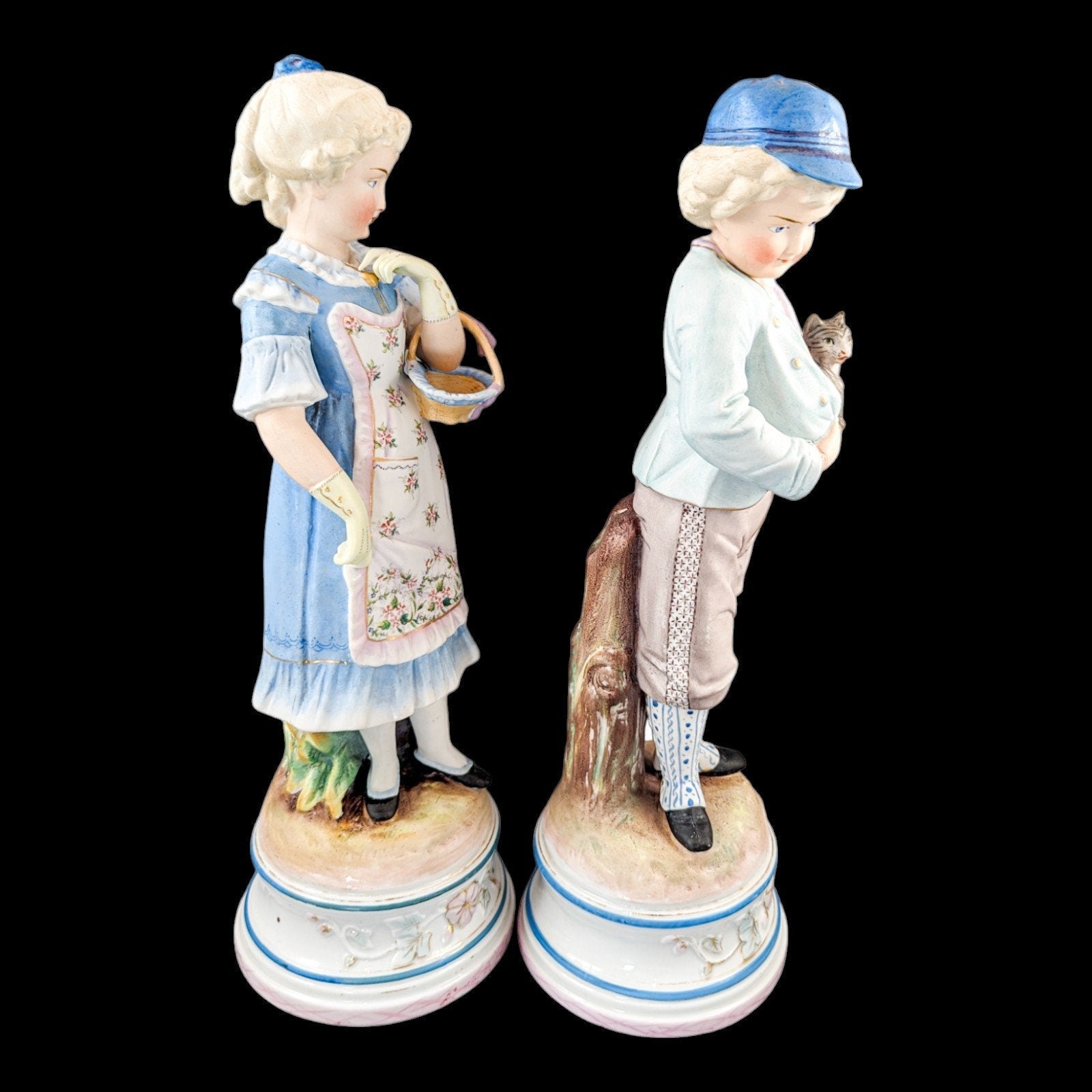 Pair of large antique 19th century French bisque porcelain figurines