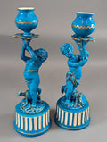 A two Minton style Cherub  candlesticks,c.1850