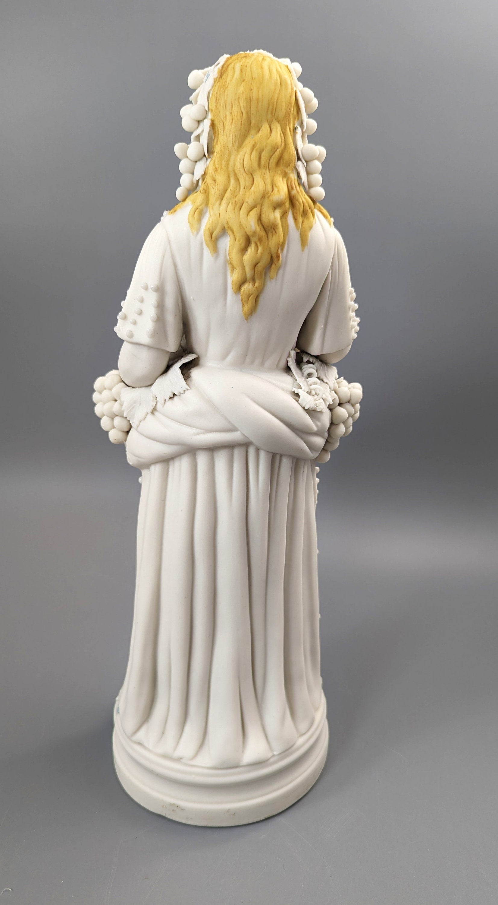 Lady With A Basket Of Grapes, parian ware porcelain, mid-19th century