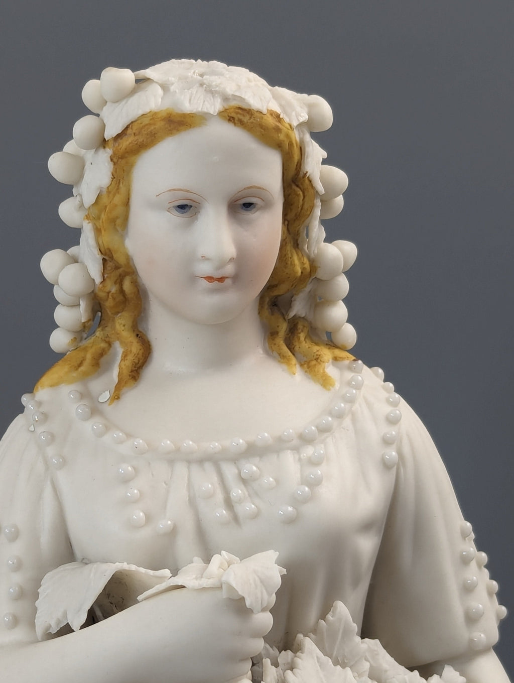 Lady With A Basket Of Grapes, parian ware porcelain, mid-19th century