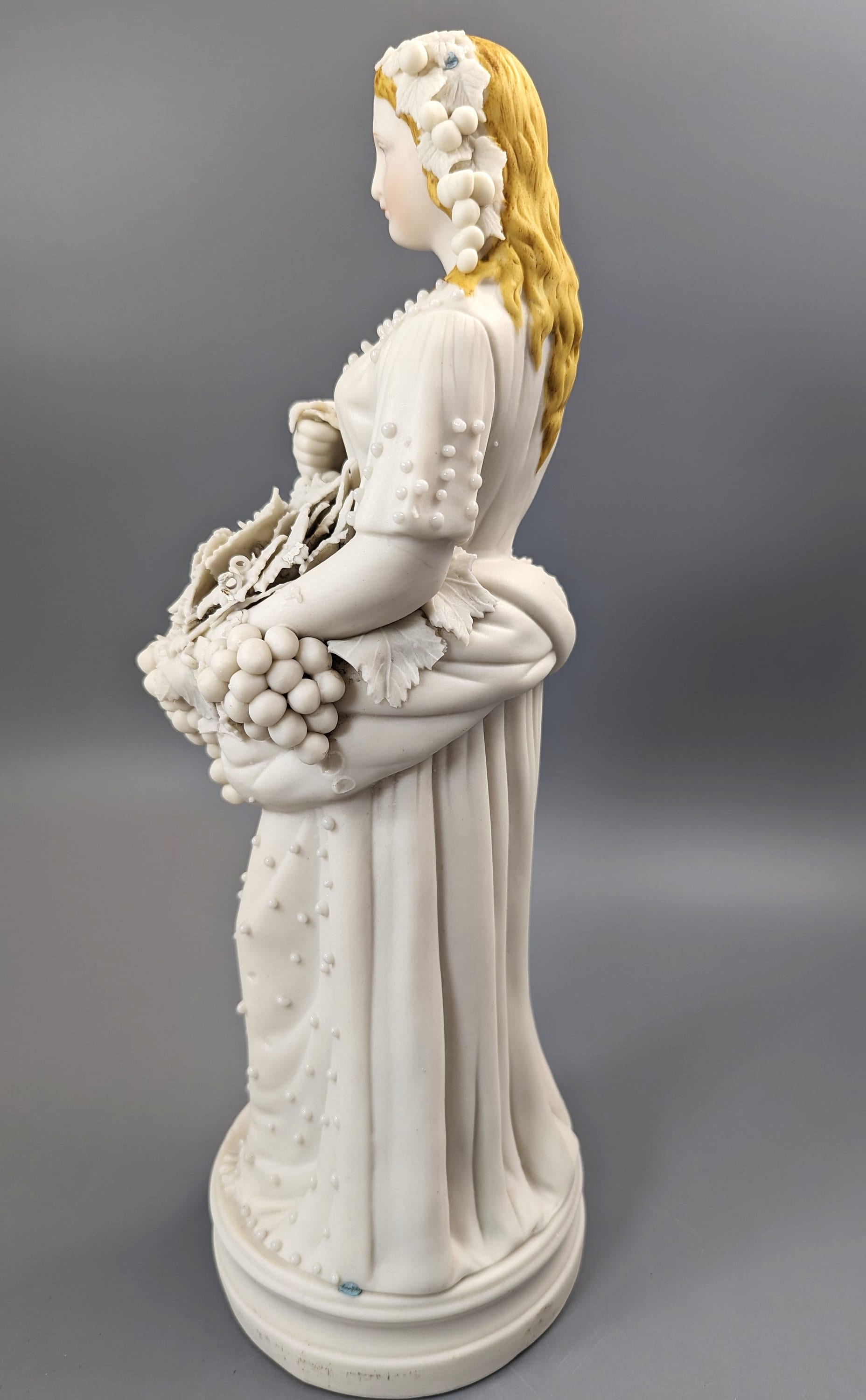 Lady With A Basket Of Grapes, parian ware porcelain, mid-19th century