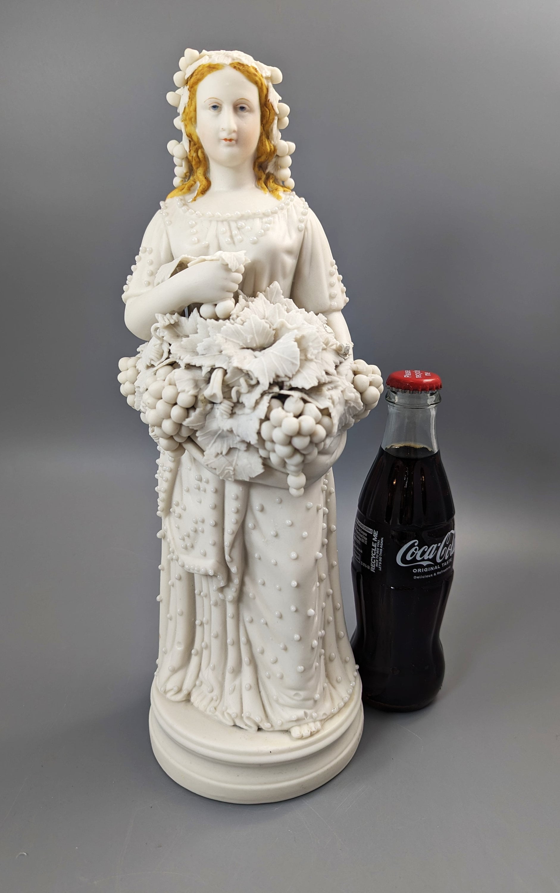 Lady With A Basket Of Grapes, parian ware porcelain, mid-19th century