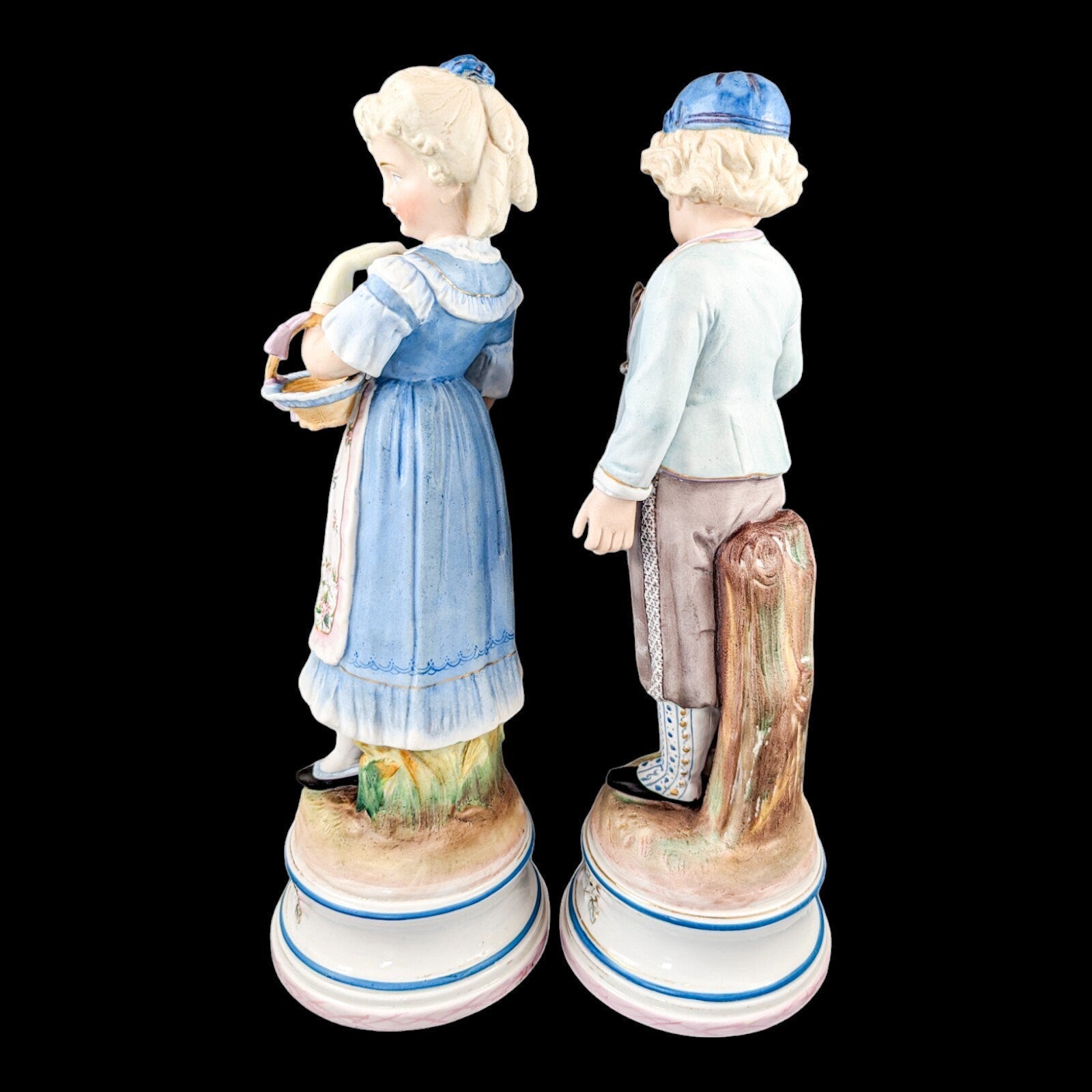 Pair of large antique 19th century French bisque porcelain figurines