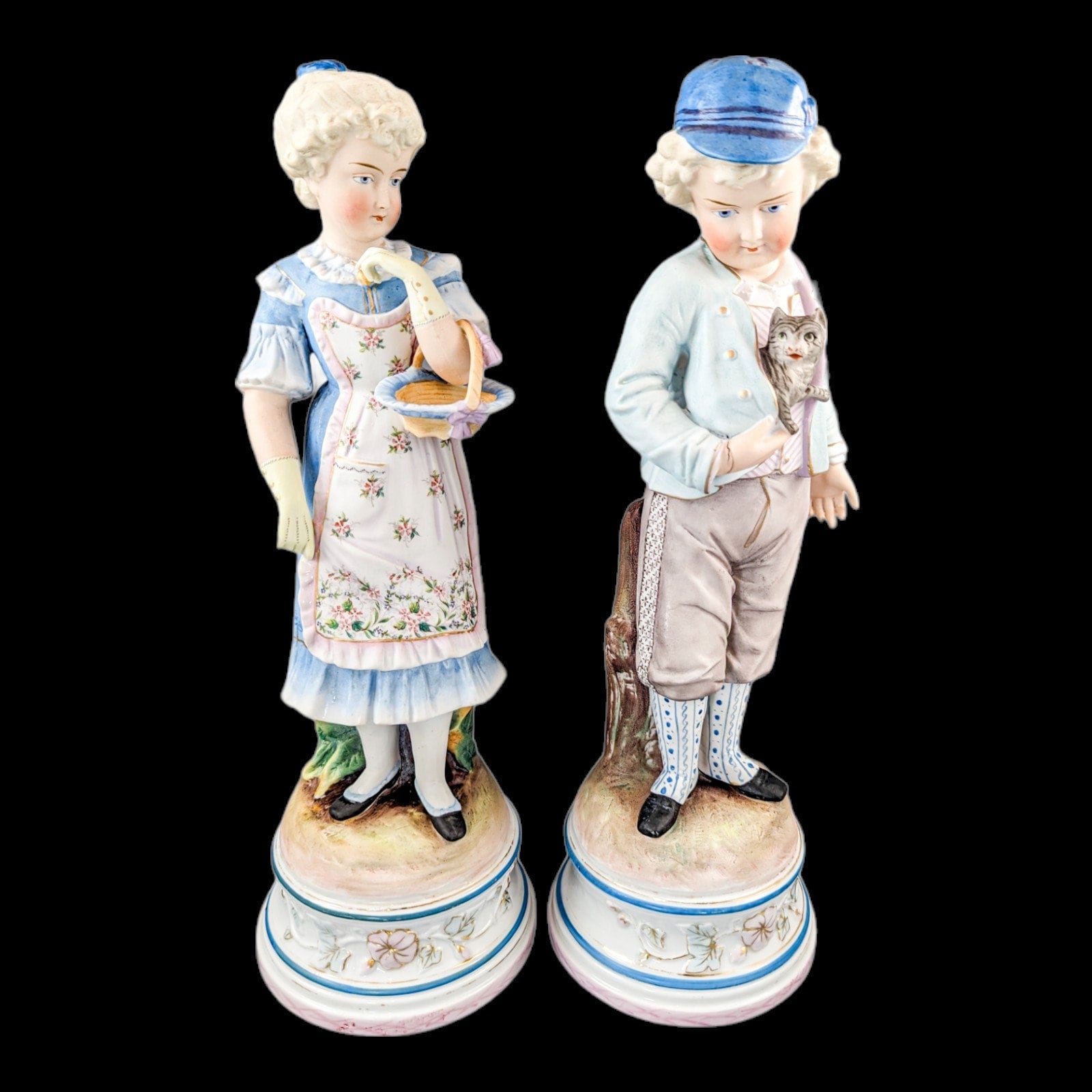 Pair of large antique 19th century French bisque porcelain figurines