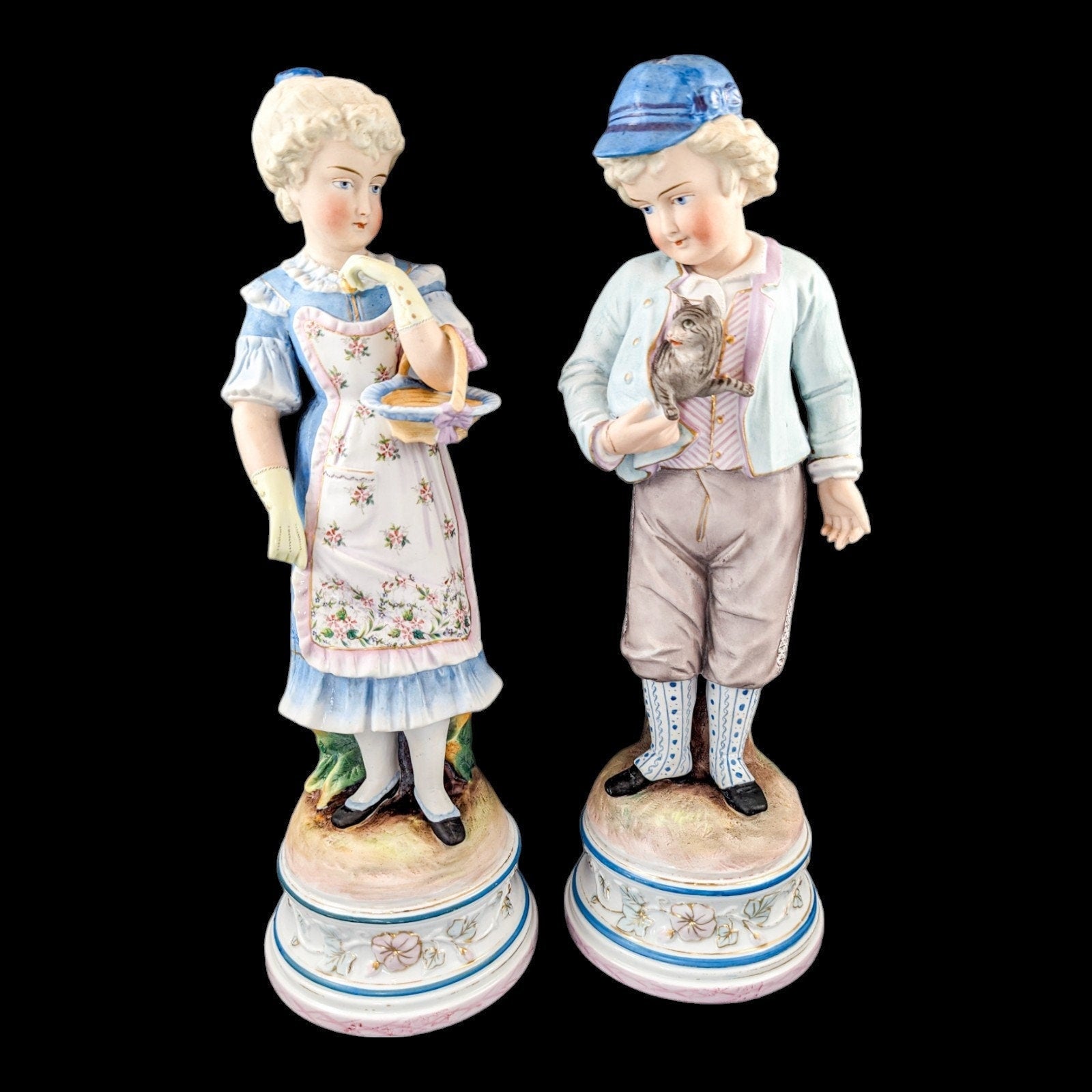 Pair of large antique 19th century French bisque porcelain figurines