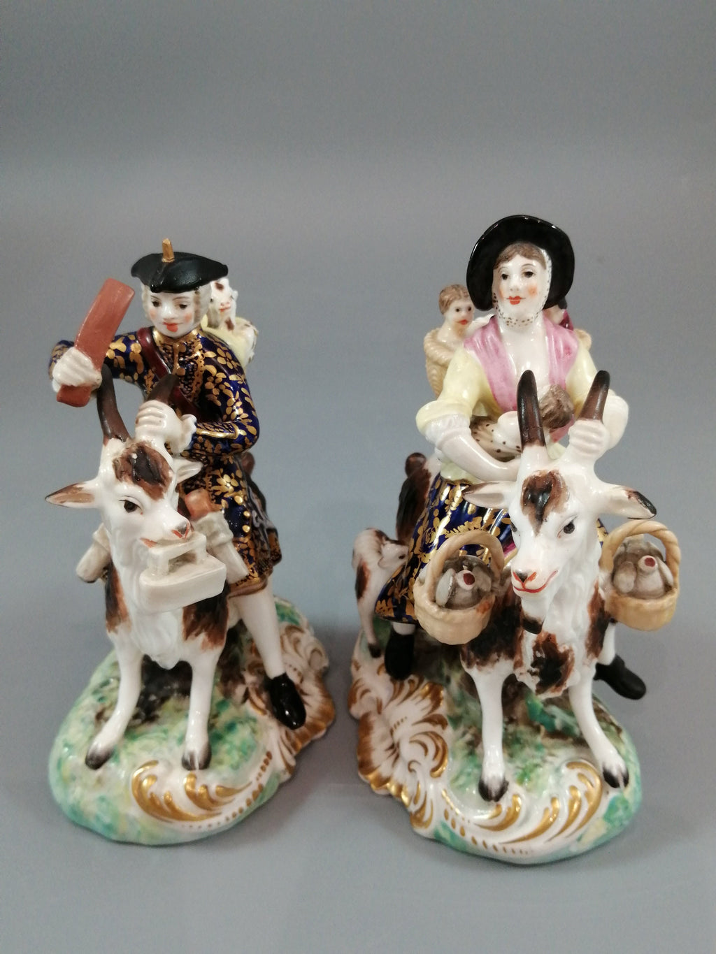 Derby figurines of the Welch Tailor and his Wife, c.1861-1935.