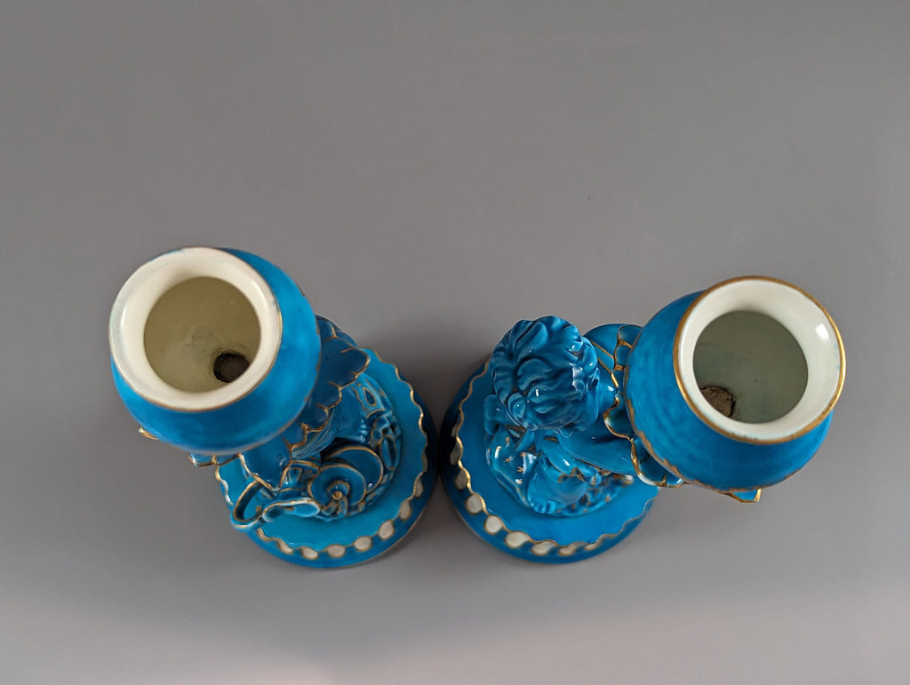A two Minton style Cherub  candlesticks,c.1850