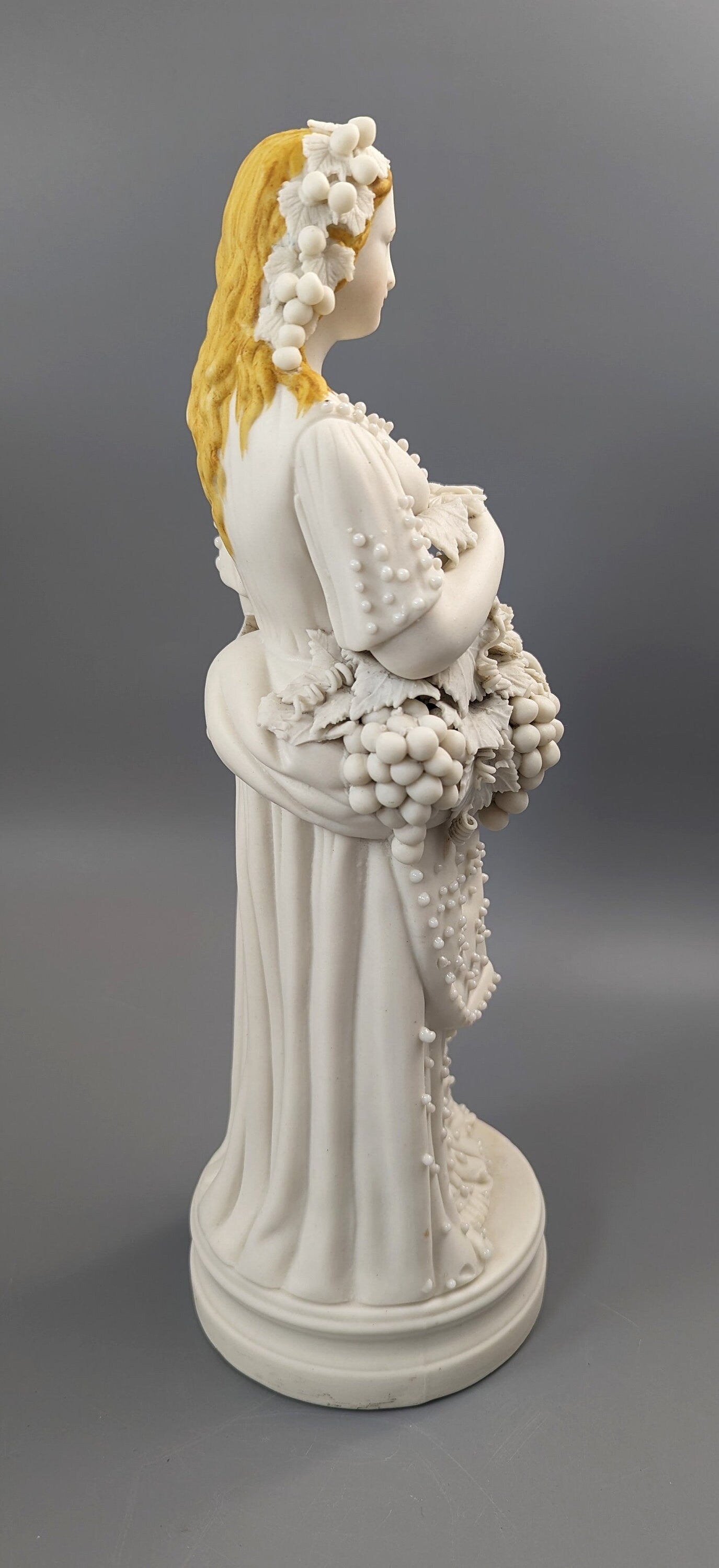 Lady With A Basket Of Grapes, parian ware porcelain, mid-19th century