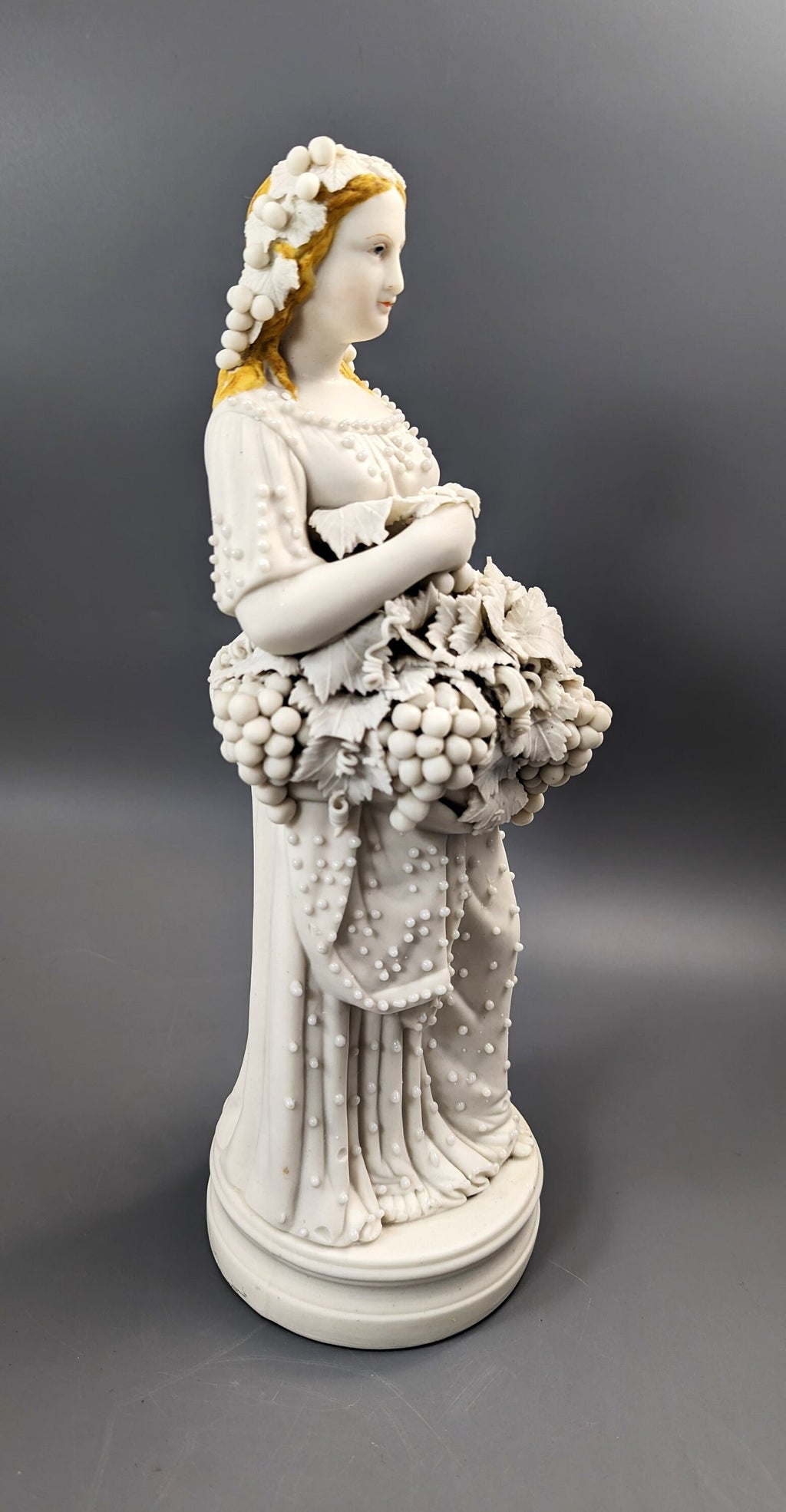 Lady With A Basket Of Grapes, parian ware porcelain, mid-19th century