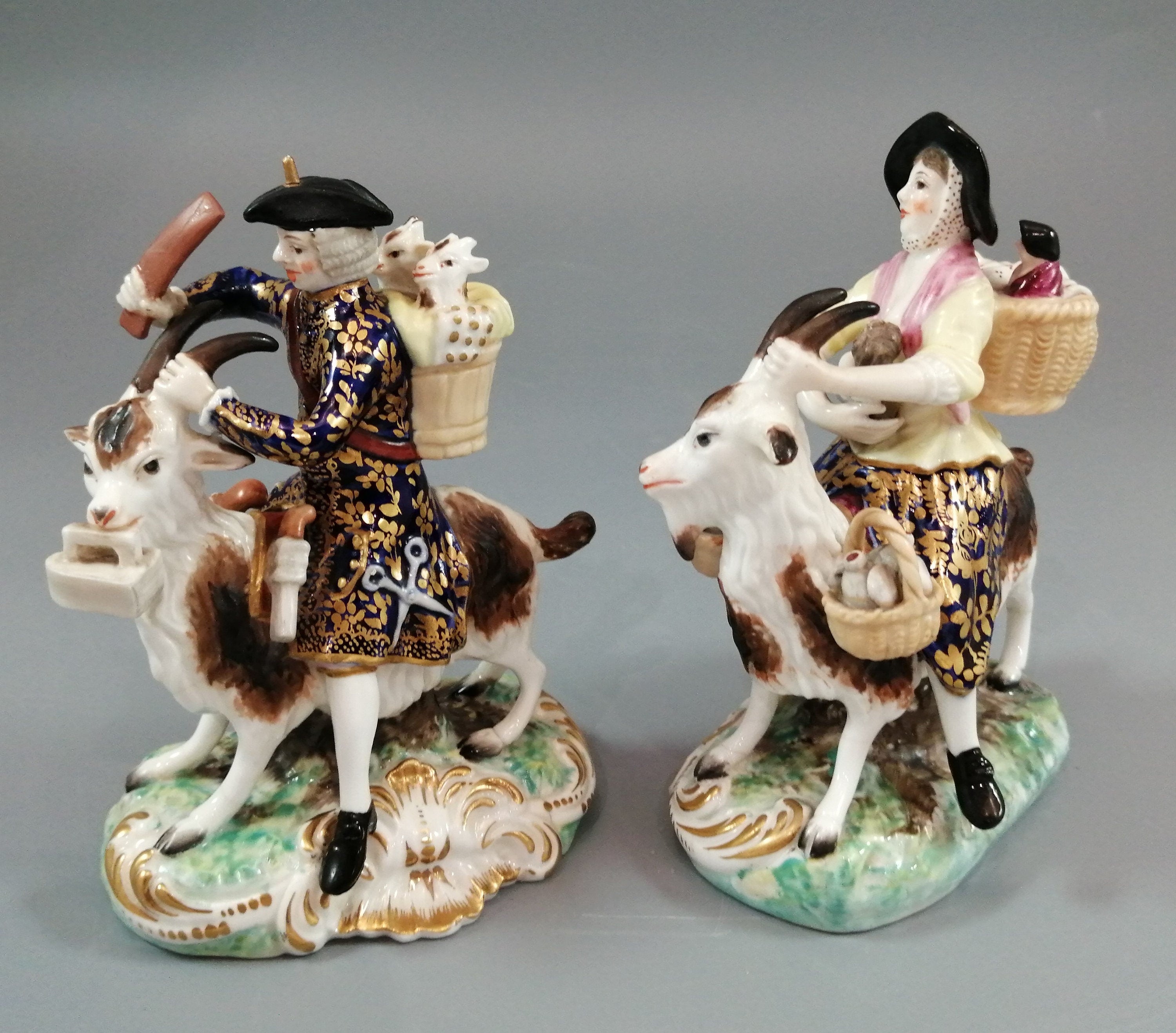 Derby figurines of the Welch Tailor and his Wife, c.1861-1935.