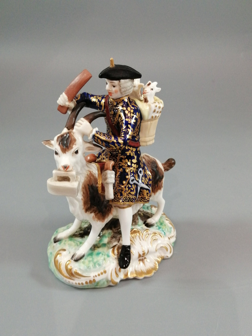 Derby figurines of the Welch Tailor and his Wife, c.1861-1935.
