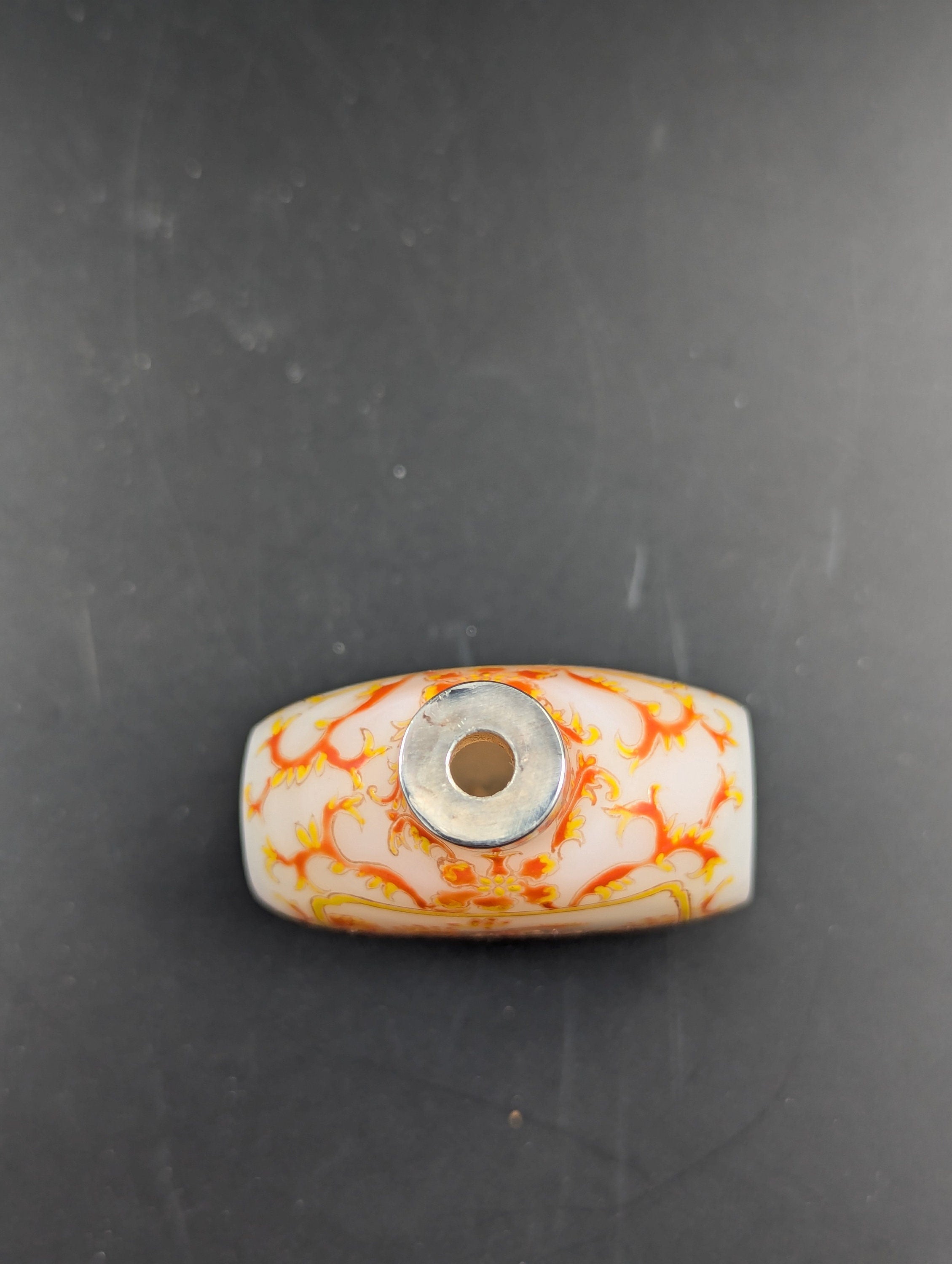 Antique enameled white glass snuff bottle with Guyue Xuan mark