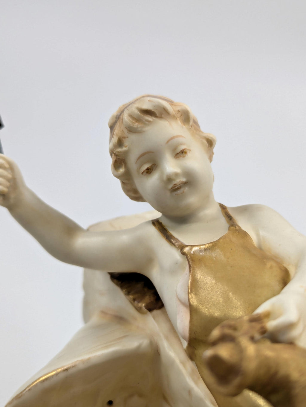 Antique Wahliss Teplitz Cupid Blacksmith Porcelain Figurine: Gilded Bohemian Art