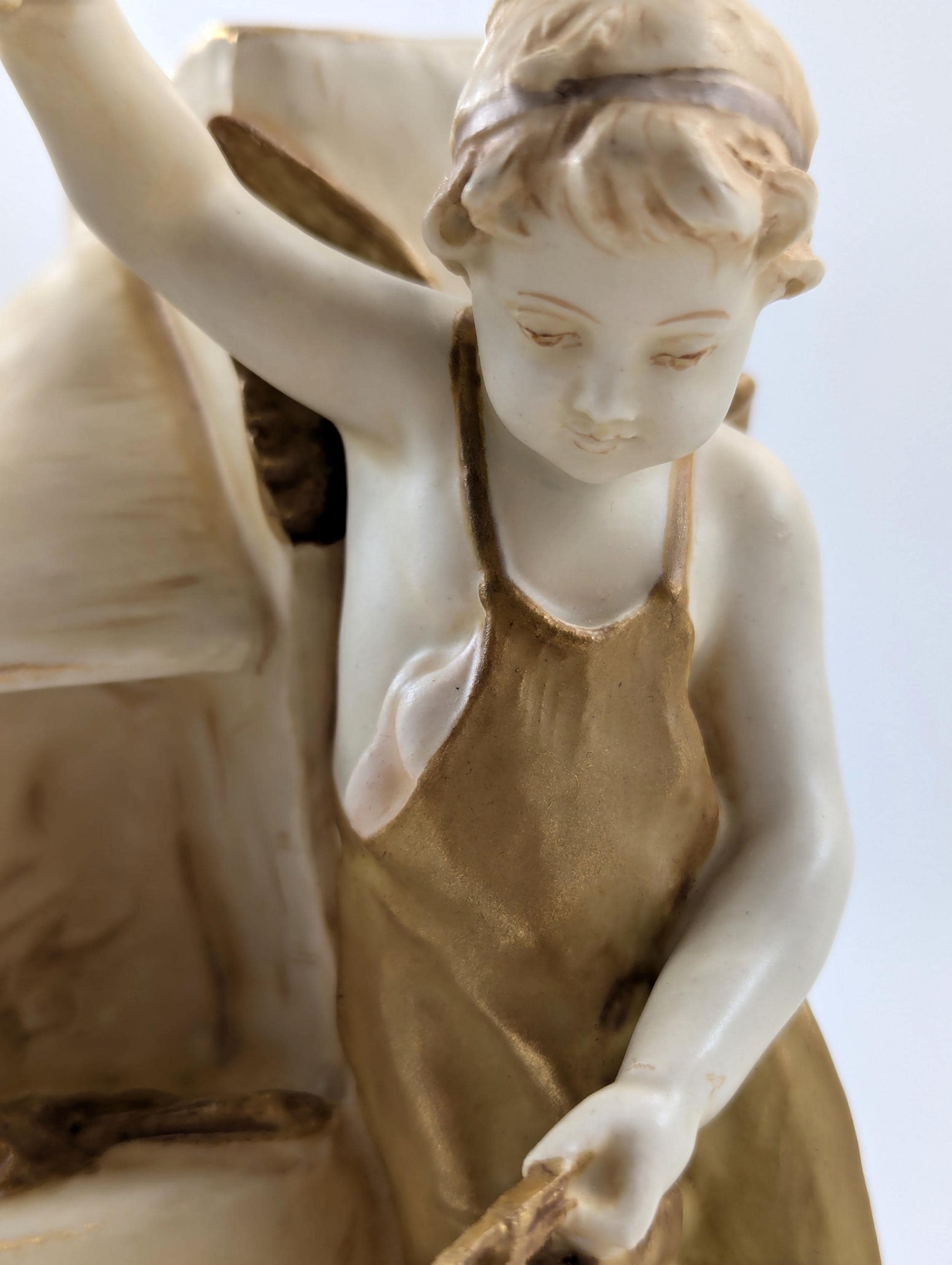 Antique Wahliss Teplitz Cupid Blacksmith Porcelain Figurine: Gilded Bohemian Art