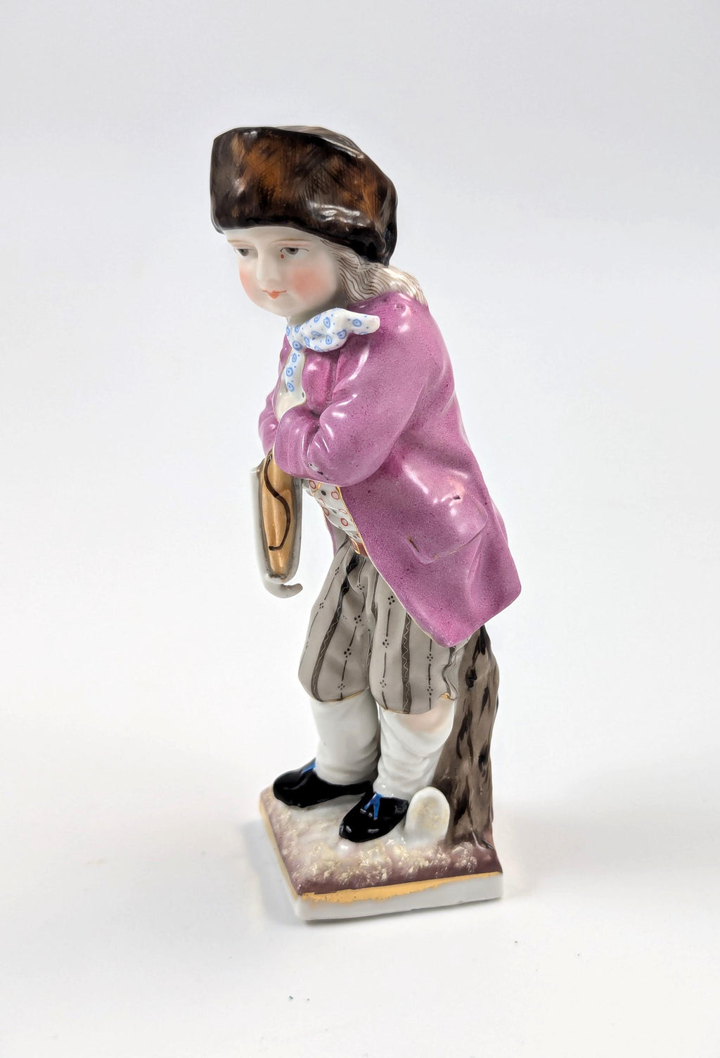 Sitzendorf antique porcelain "Skater" figurine hand-painted on gilt base, Germany, c. 1880s
