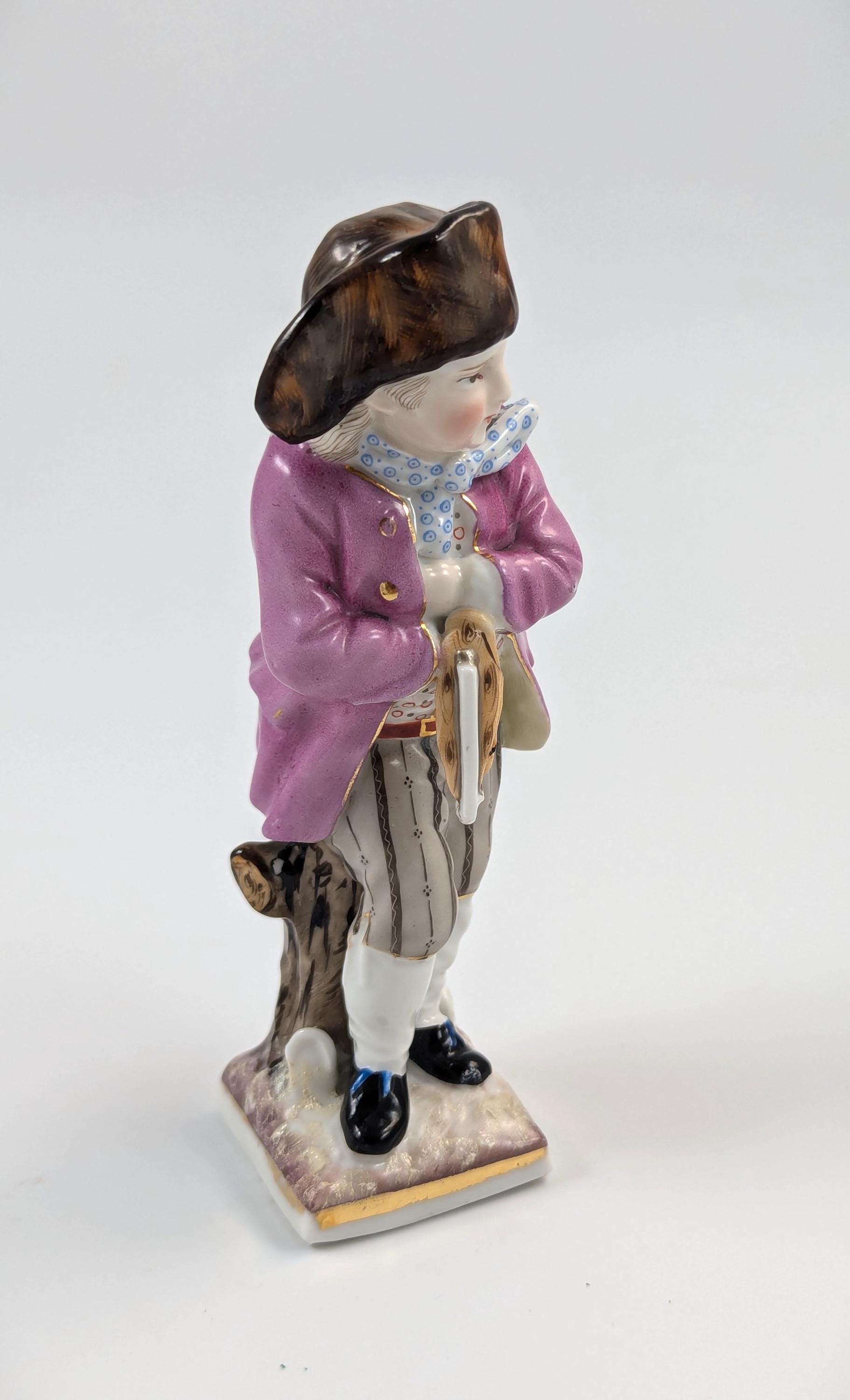 Sitzendorf antique porcelain "Skater" figurine hand-painted on gilt base, Germany, c. 1880s