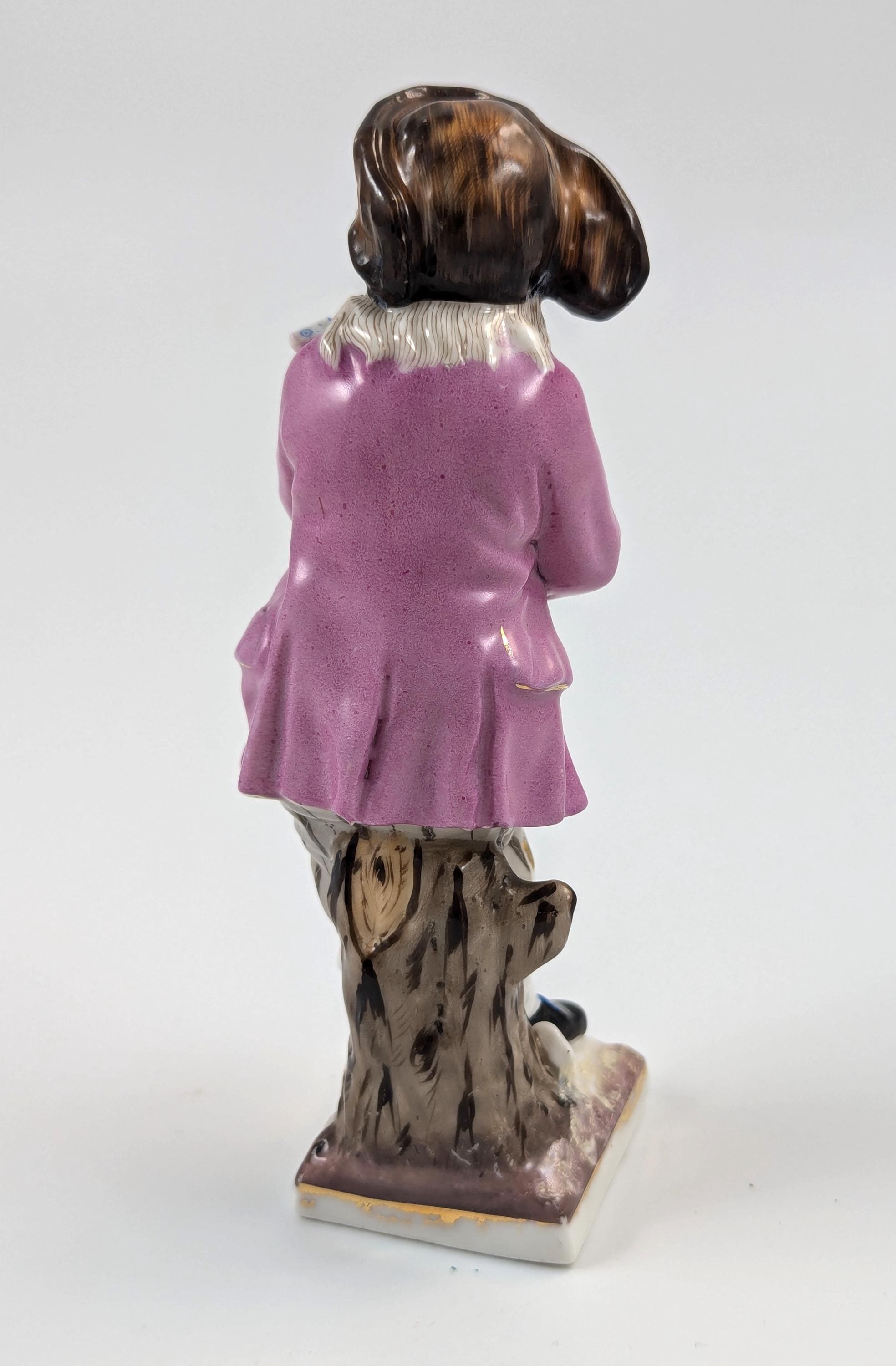 Sitzendorf antique porcelain "Skater" figurine hand-painted on gilt base, Germany, c. 1880s
