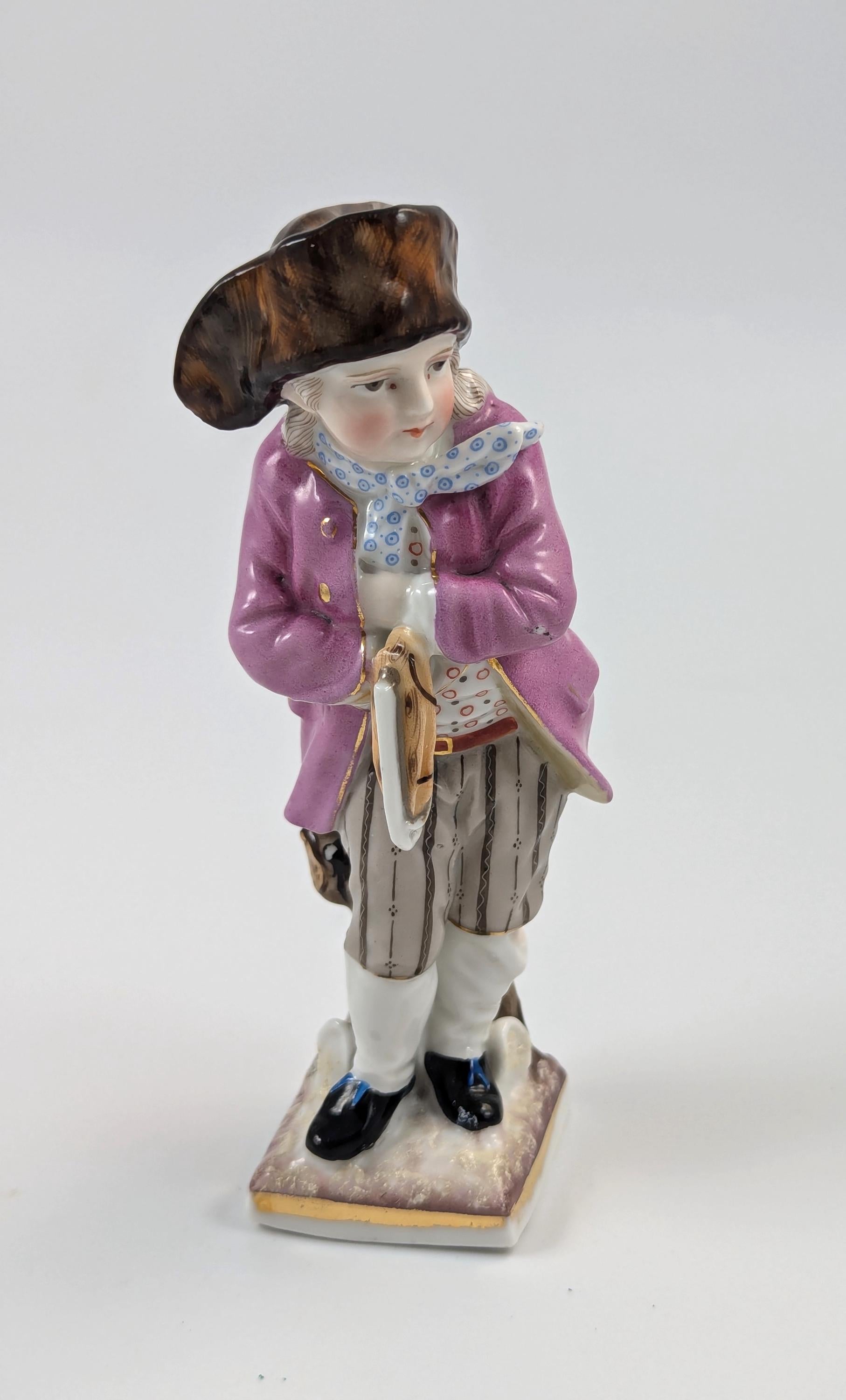 Sitzendorf antique porcelain "Skater" figurine hand-painted on gilt base, Germany, c. 1880s