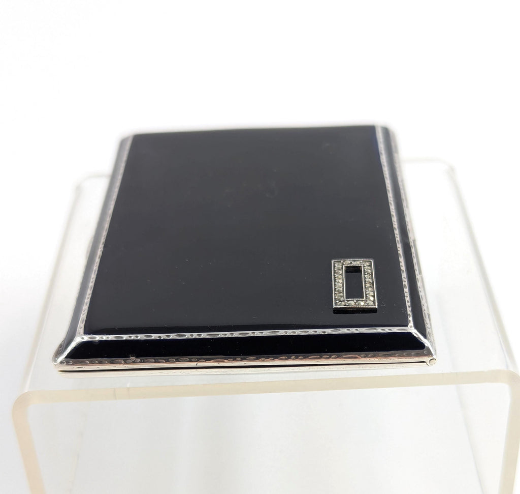 Art Deco sterling silver and black enamel cigarette case, marcasite front, engine-turned reverse, Goldsmiths & Silversmiths Co, 1932