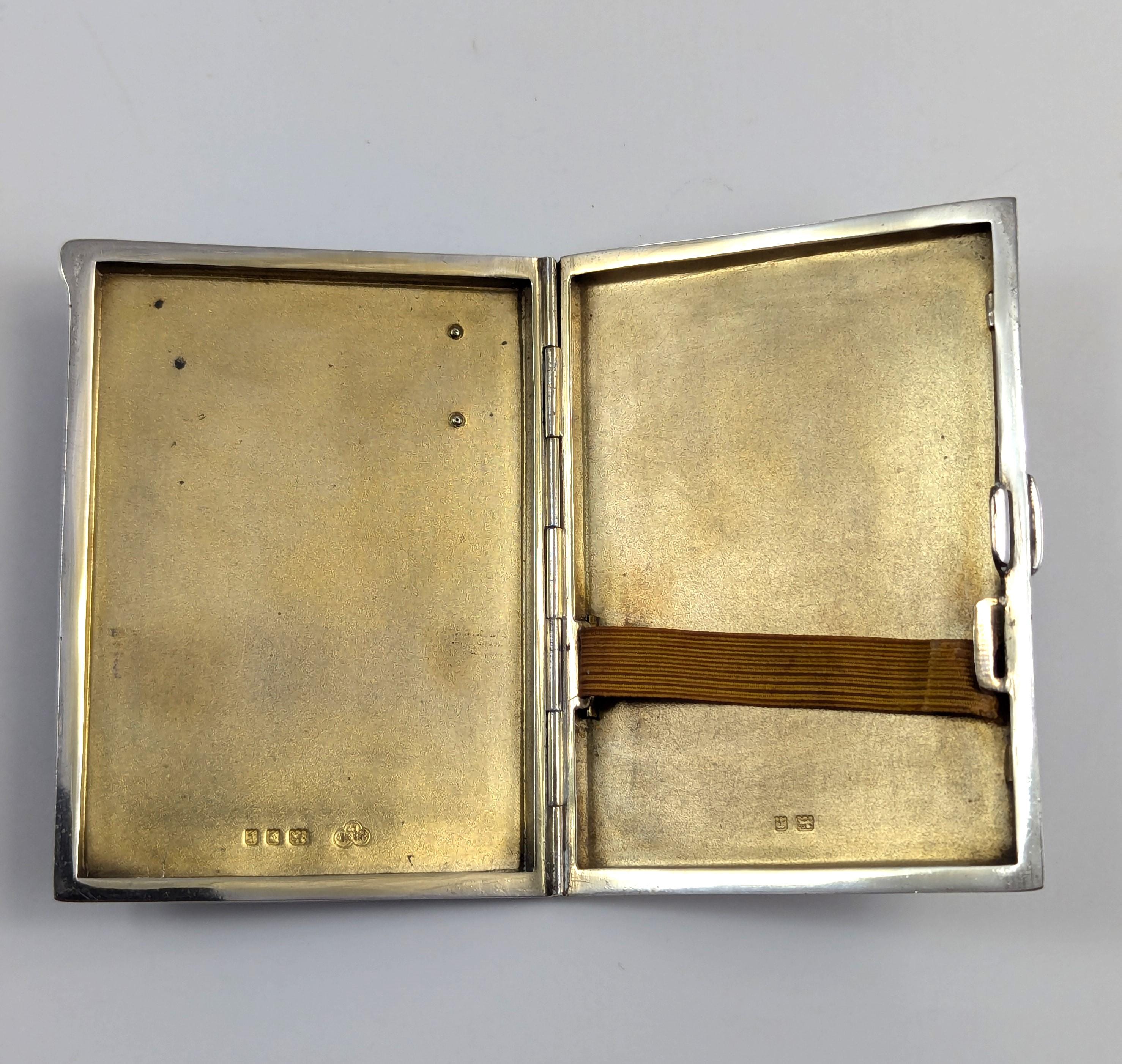 Art Deco sterling silver and black enamel cigarette case, marcasite front, engine-turned reverse, Goldsmiths & Silversmiths Co, 1932