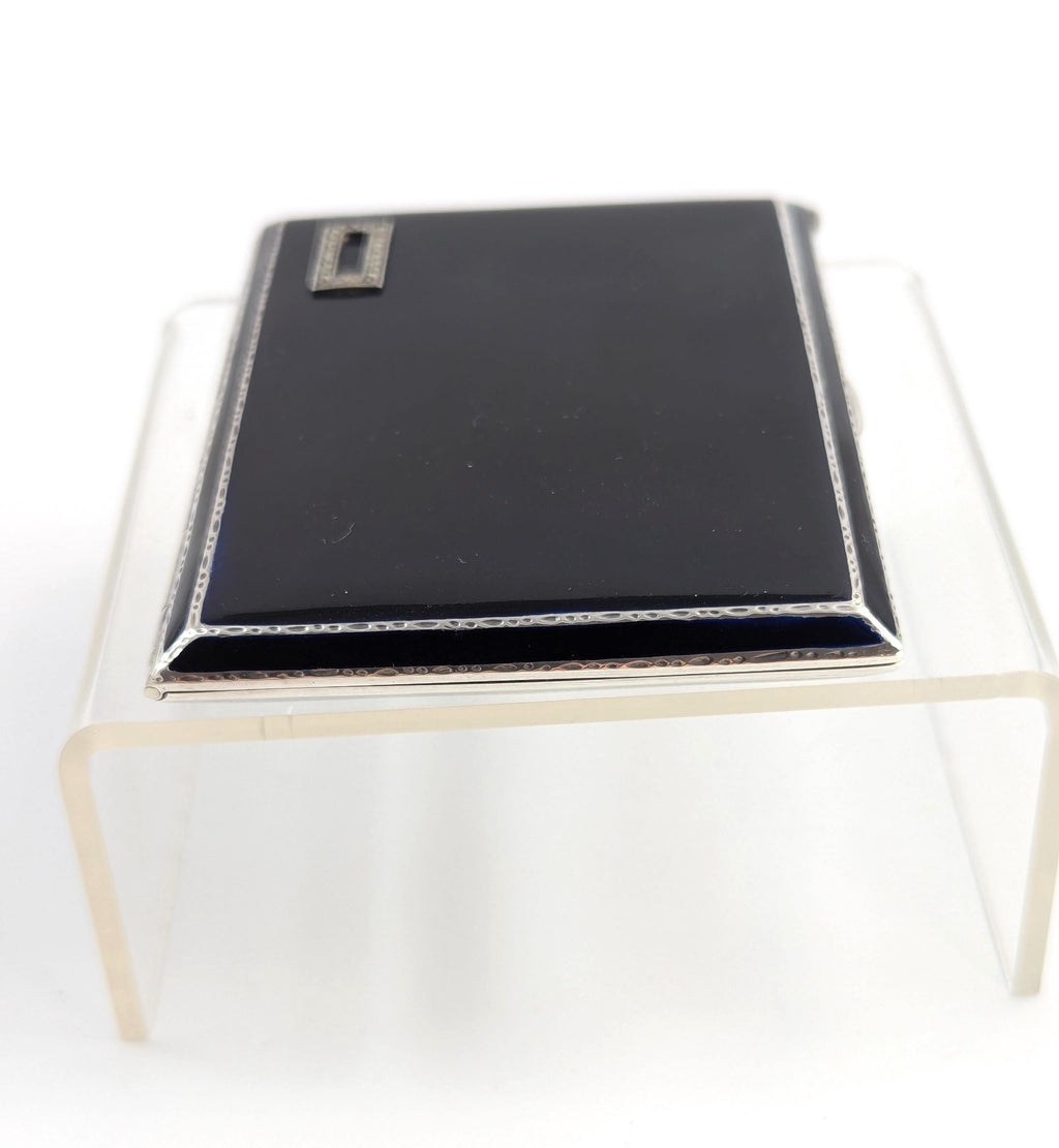 Art Deco sterling silver and black enamel cigarette case, marcasite front, engine-turned reverse, Goldsmiths & Silversmiths Co, 1932