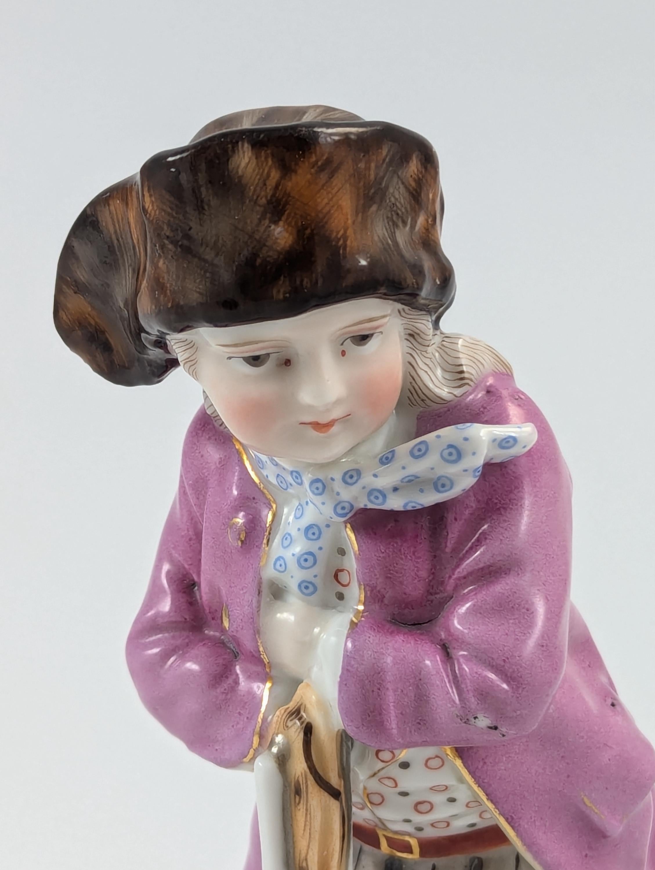 Sitzendorf antique porcelain "Skater" figurine hand-painted on gilt base, Germany, c. 1880s