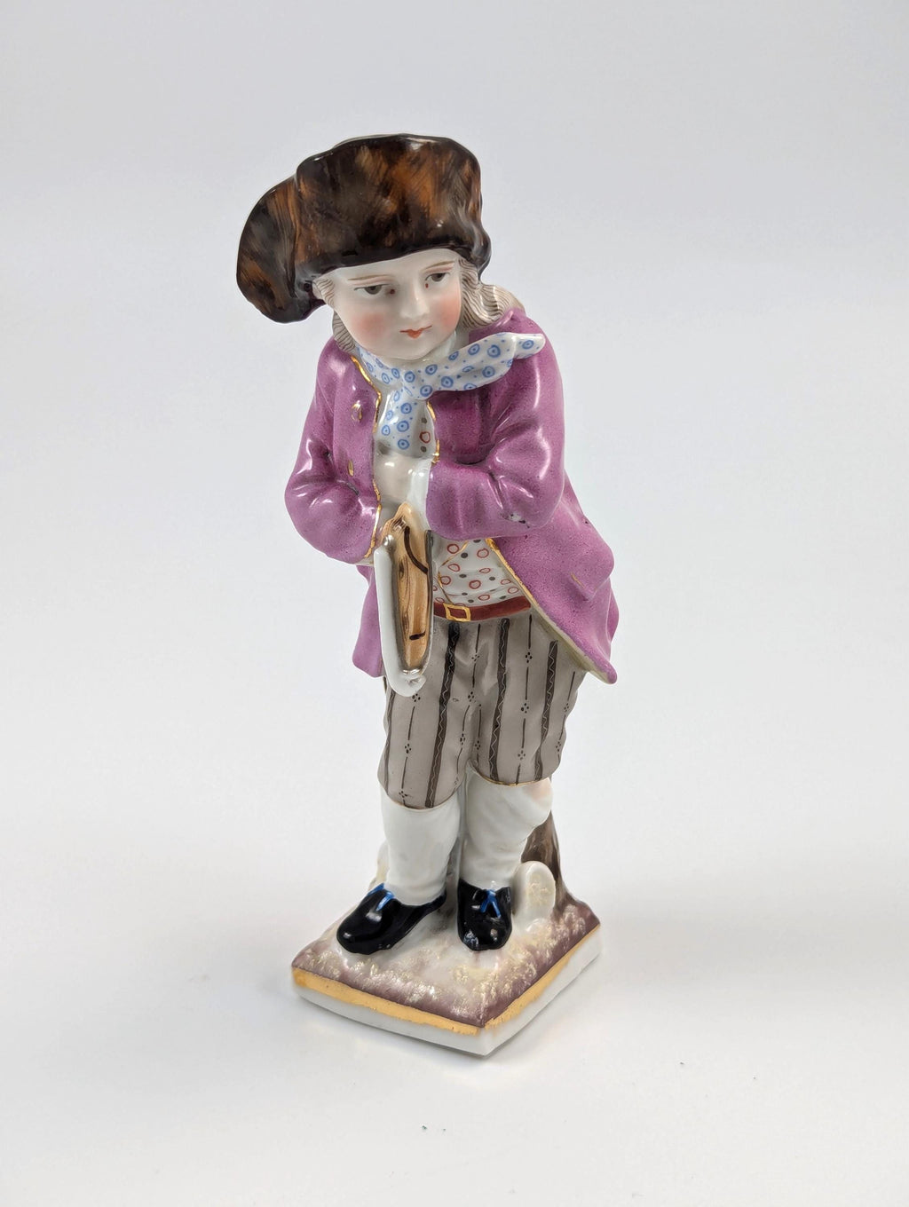 Sitzendorf antique porcelain "Skater" figurine hand-painted on gilt base, Germany, c. 1880s