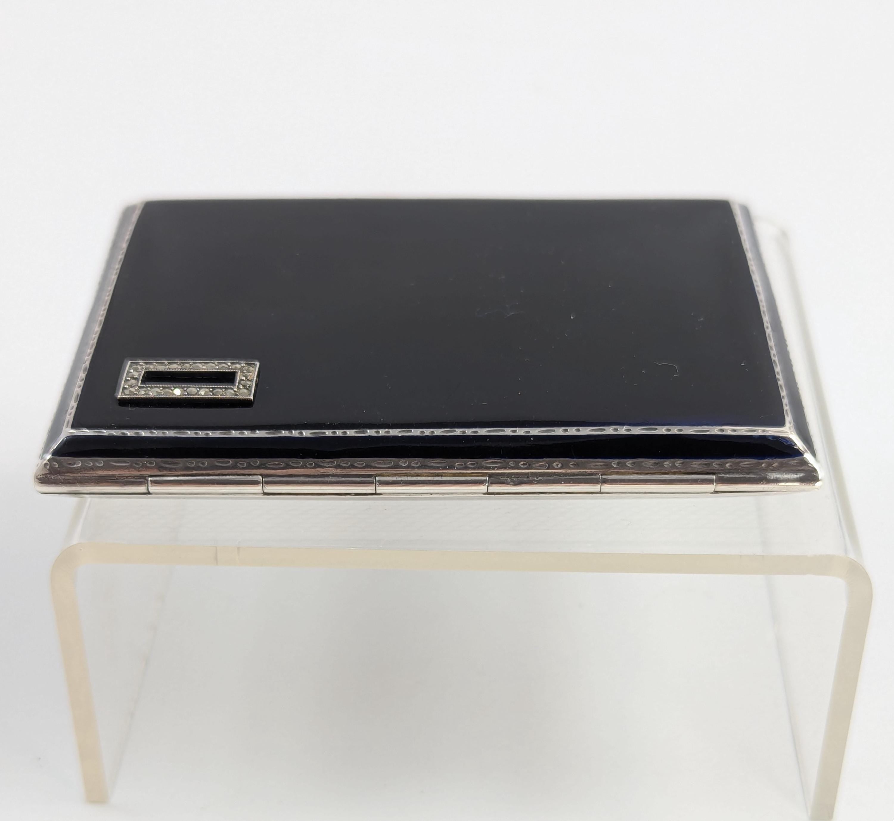 Art Deco sterling silver and black enamel cigarette case, marcasite front, engine-turned reverse, Goldsmiths & Silversmiths Co, 1932