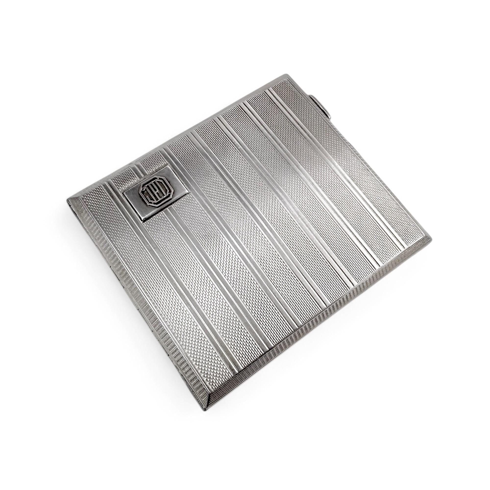 Large gilt sterling silver WWII cigarette case with engine-turned design, 130 g