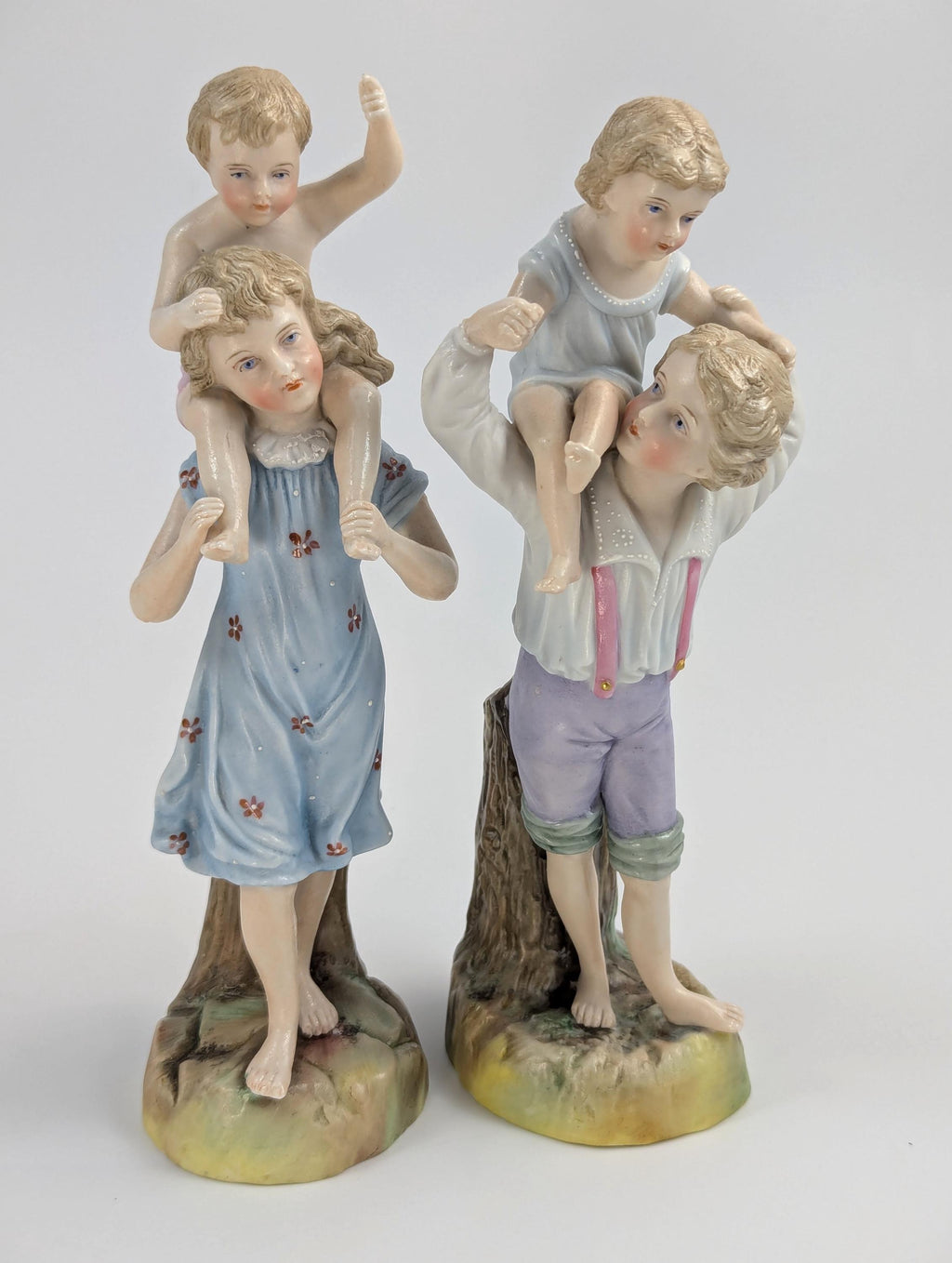 Ernst Bohne and Söhne Figurines: Boy and Girl Holding Children, c. 1887
