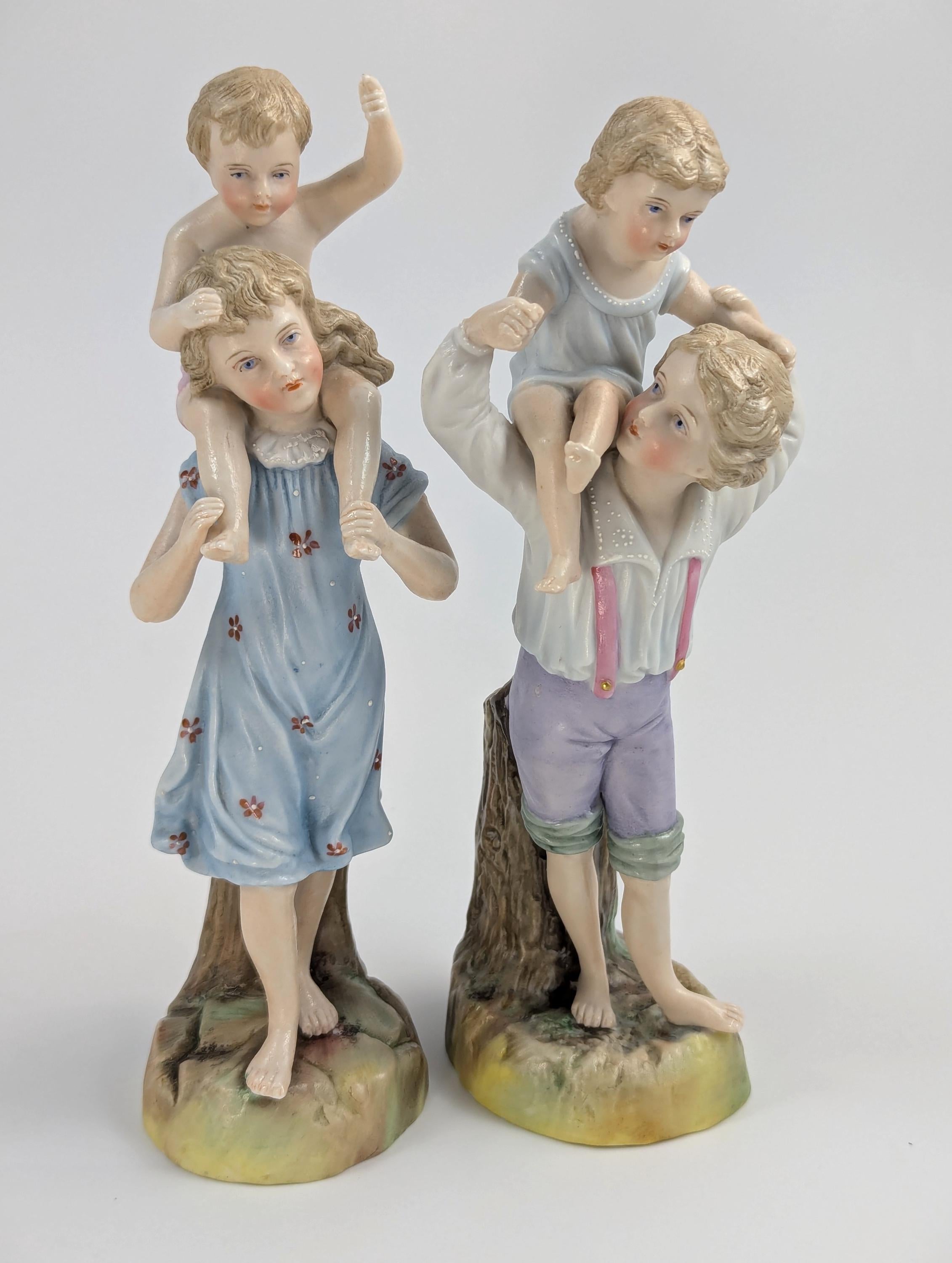 Ernst Bohne and Söhne Figurines: Boy and Girl Holding Children, c. 1887