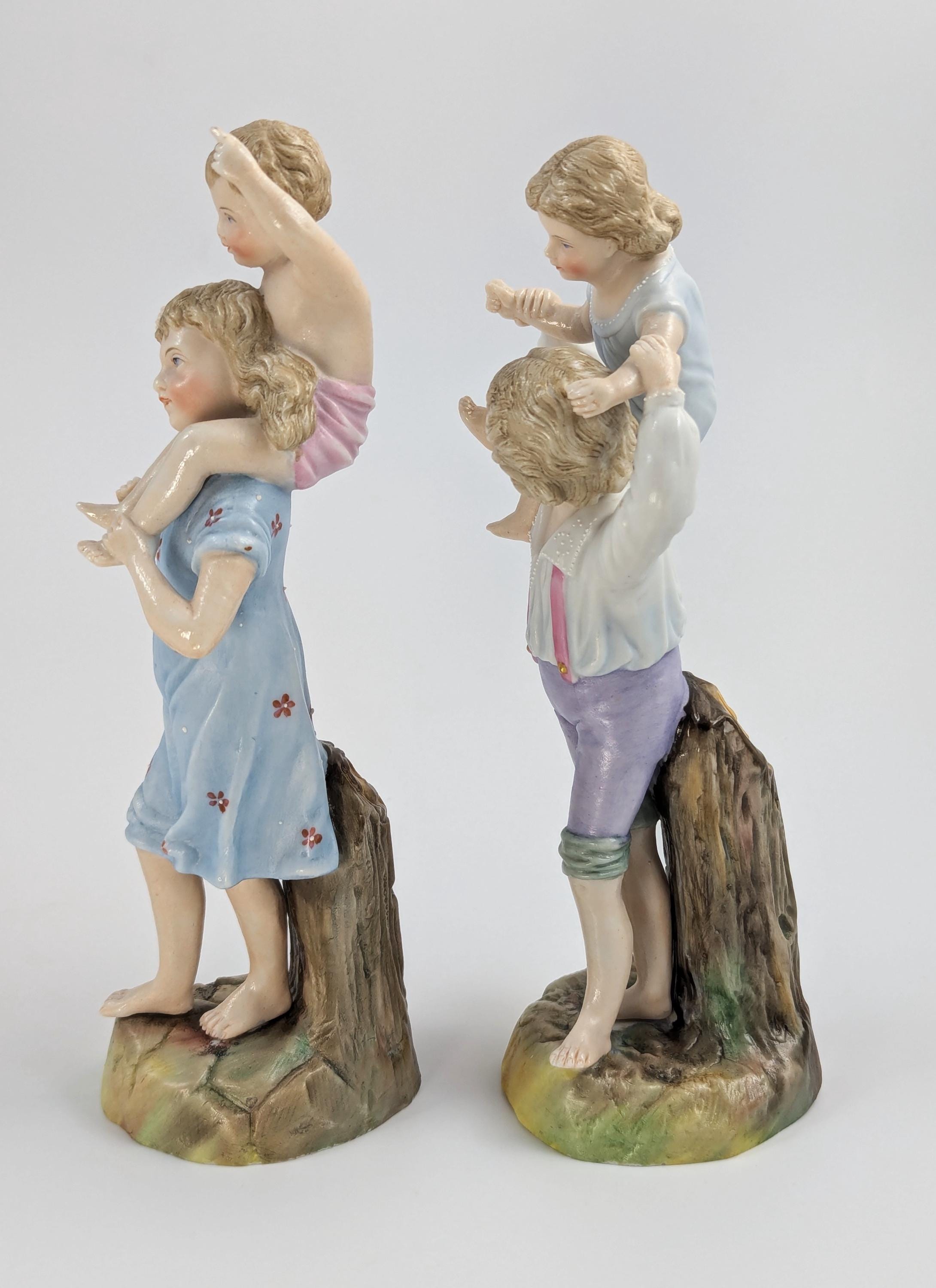 Ernst Bohne and Söhne Figurines: Boy and Girl Holding Children, c. 1887