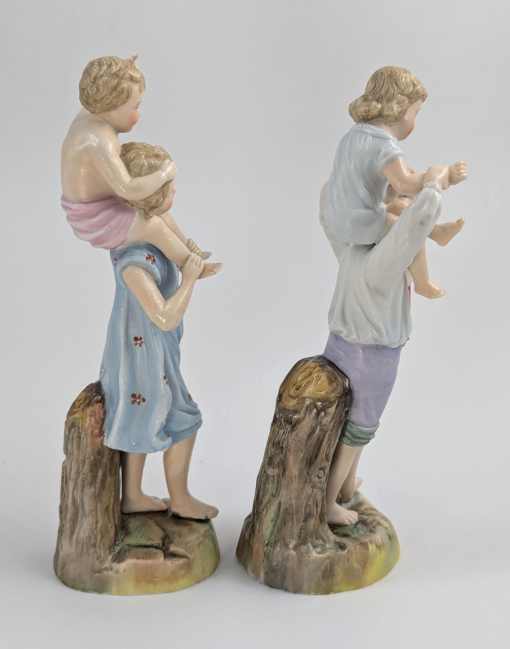 Ernst Bohne and Söhne Figurines: Boy and Girl Holding Children, c. 1887