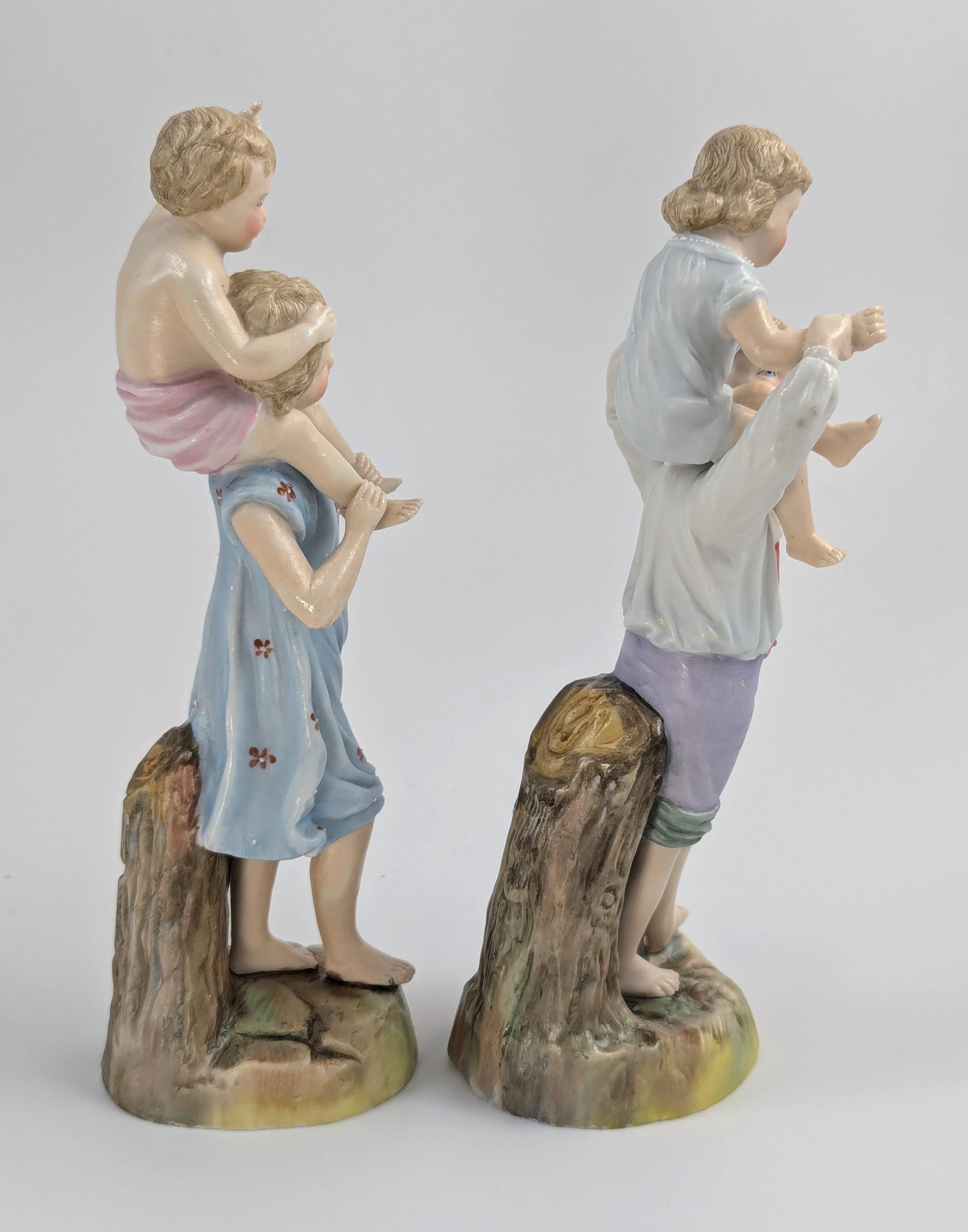 Ernst Bohne and Söhne Figurines: Boy and Girl Holding Children, c. 1887