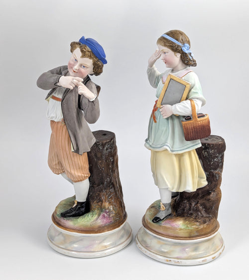 A Pair of Bisque Porcelain Figurines, France, 19th century.